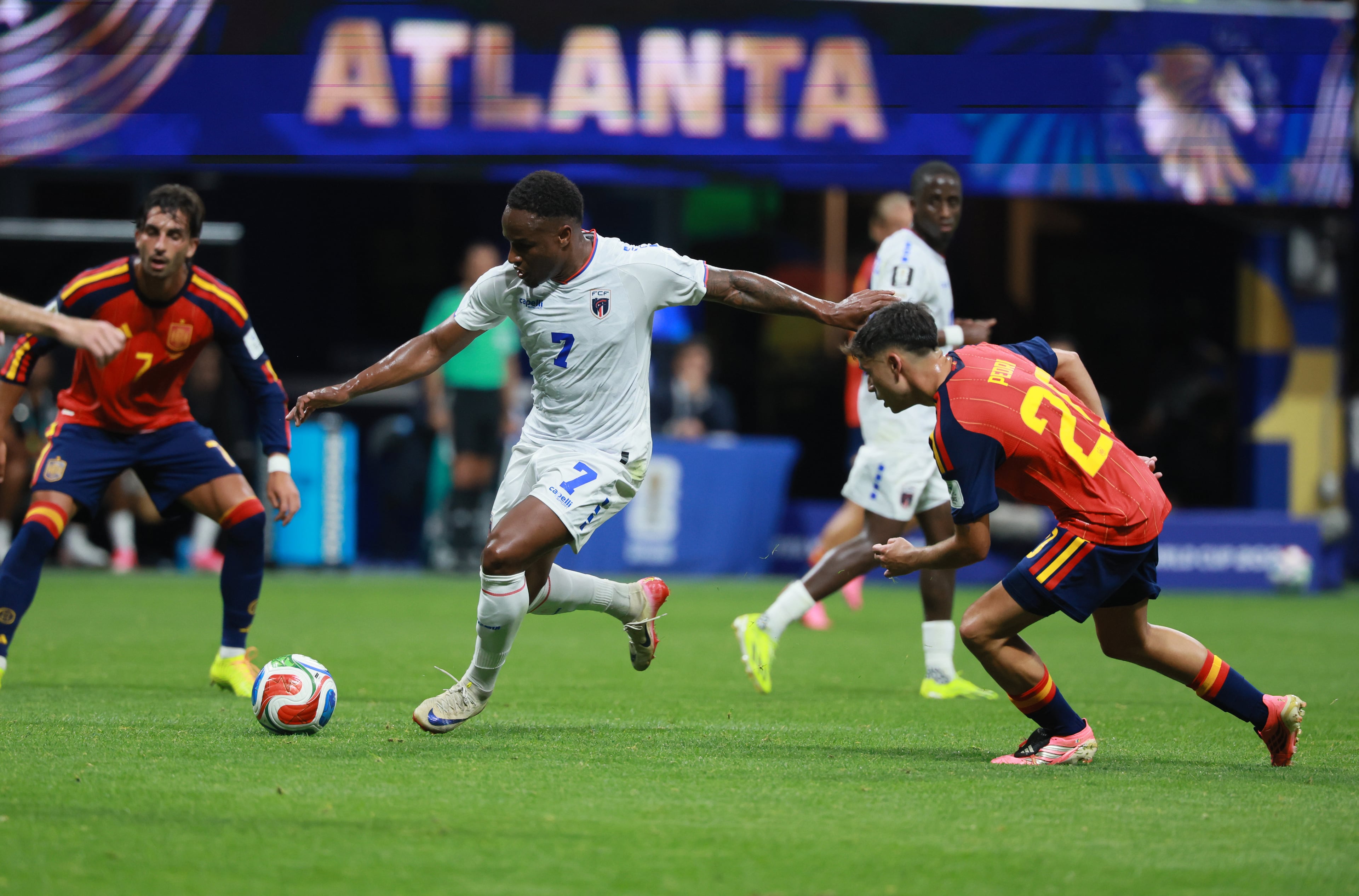 Cape Verde's Jovane Cabral (center) controls the ball against Spain's Pedri (right) during first half of Spain vs. Cape Verde Group H match at Atlanta Stadium (Mercedes-Benz Stadium) on Monday, June 15, 2026. (Jason Getz/AJC)