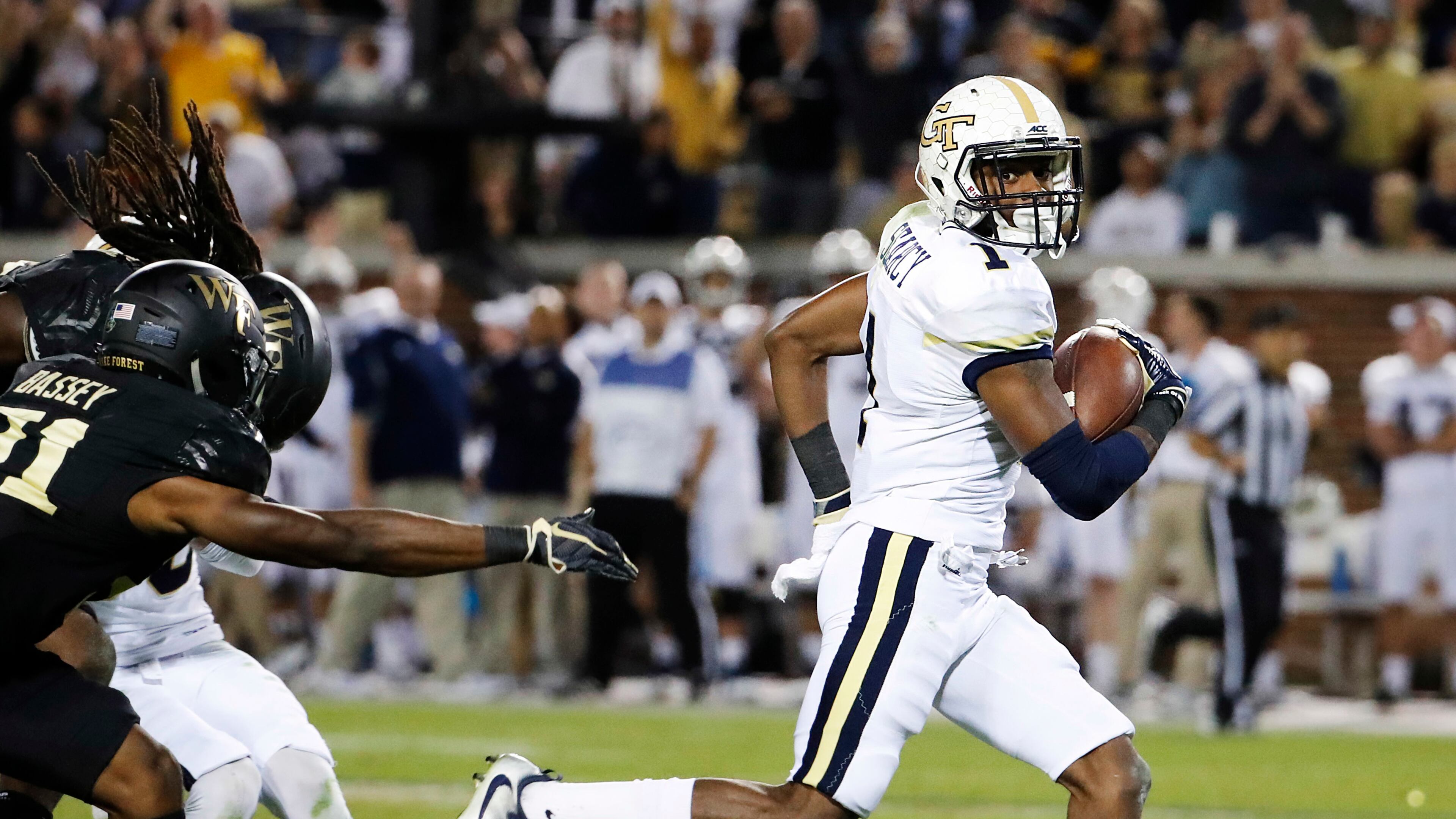 Georgia Tech's Qua Searcy, right, runs for a touchdown in the third quarter of an NCAA college football game against Wake Forest in Atlanta, Saturday, Oct. 21, 2017. (AP Photo/David Goldman)