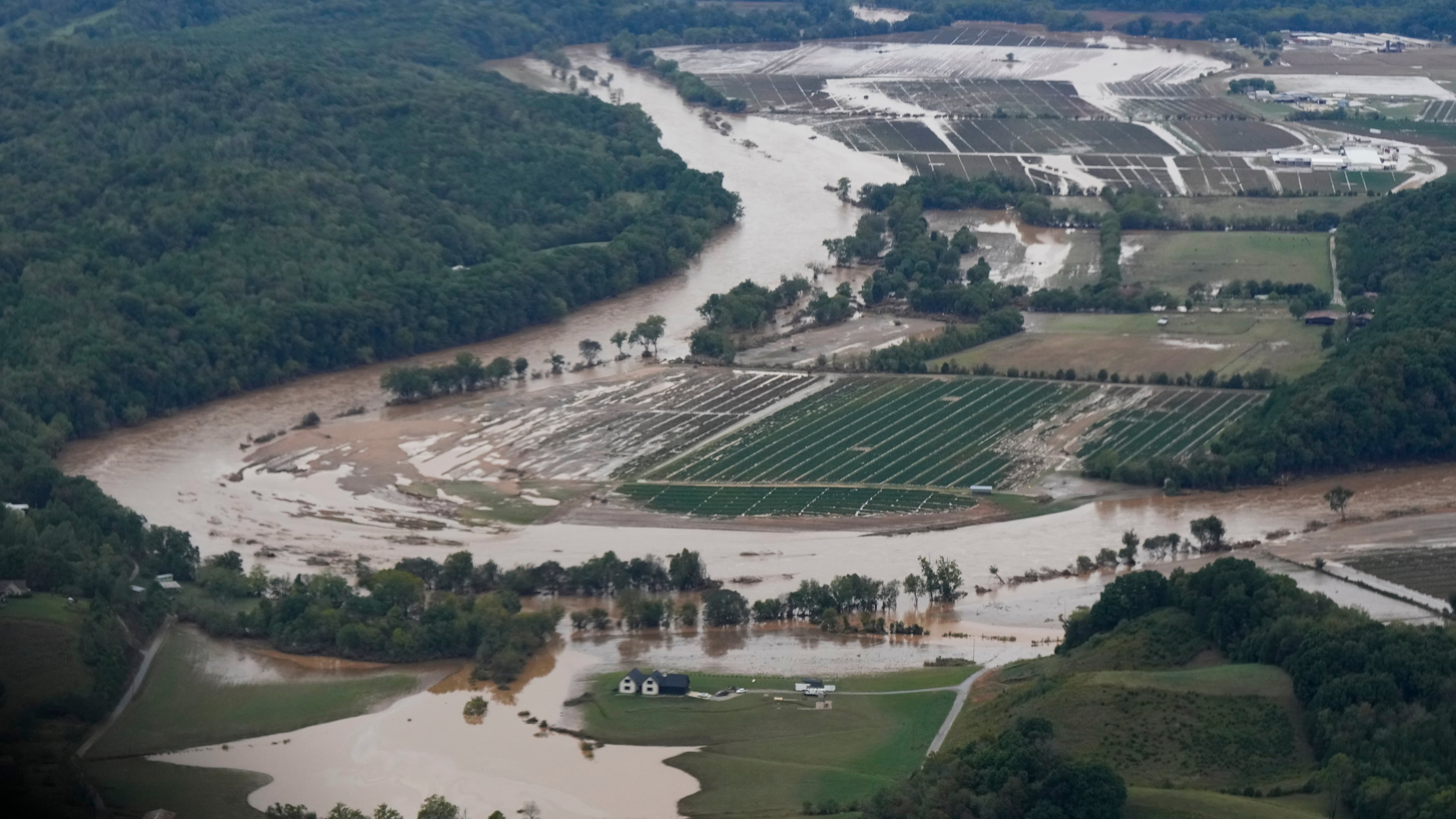 FILE - An aerial view of flood damage left in the aftermath of Hurricane Helene is seen Sept. 28, 2024, in Greene County, Tenn. (AP Photo/George Walker IV, File)