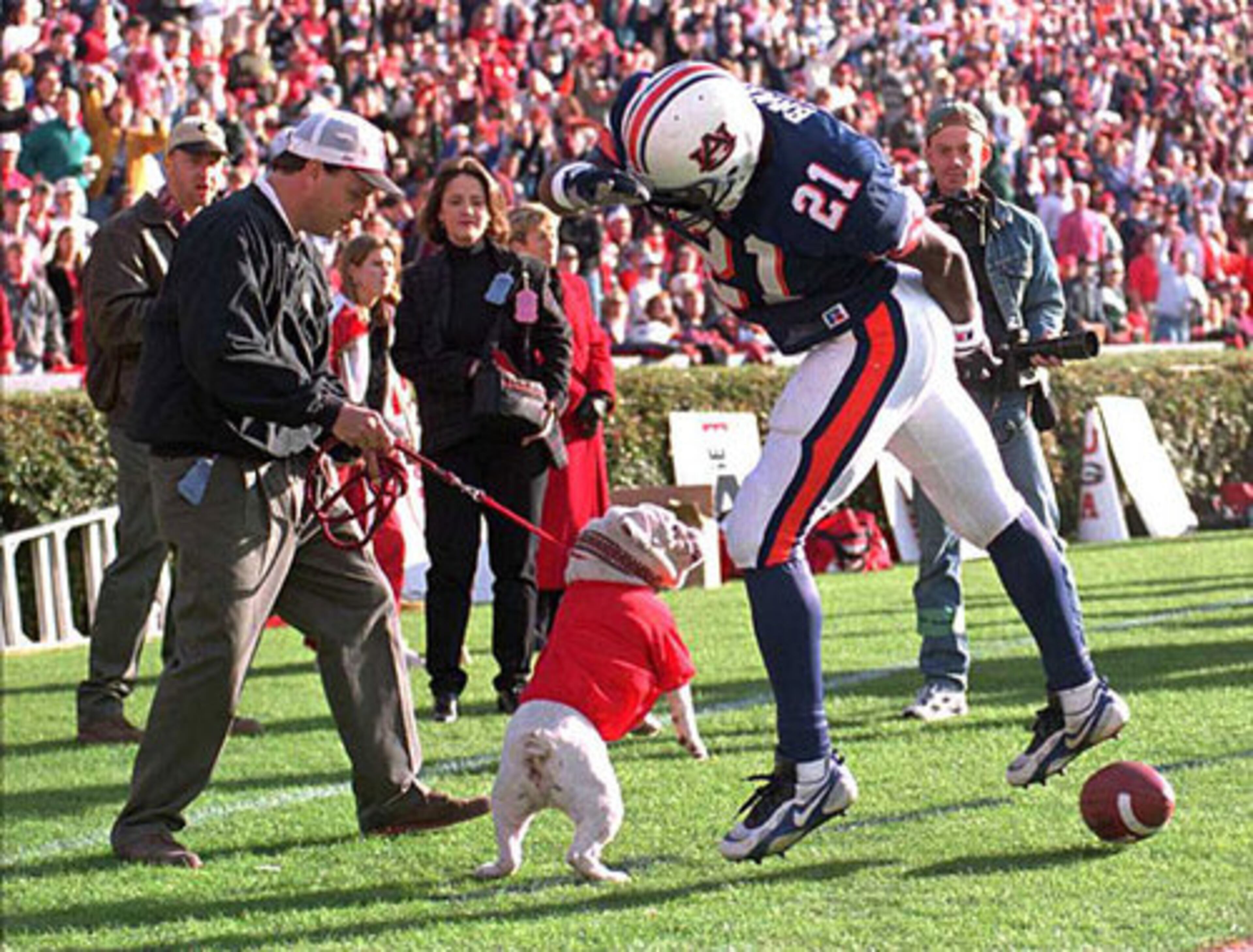 Uga V: 1990-99 (including snapping at Auburn's Robert Baker in 1999), 77-24-4