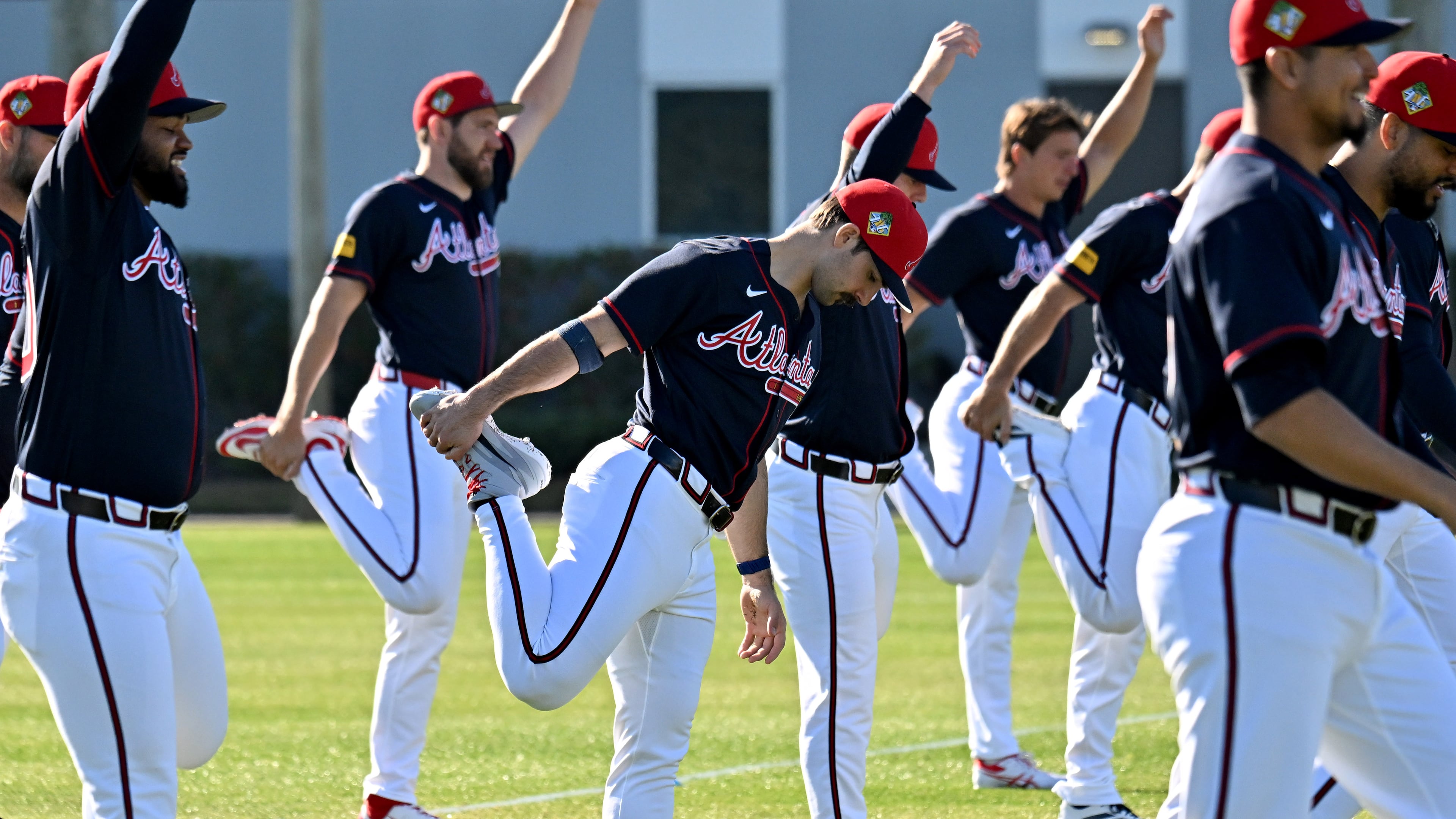 Braves pitcher Spencer Strider (center) — pictured during pitcher and catcher workouts in February — left his start Friday with right elbow and shoulder discomfort. After being evaluated Monday, Strider will be shut down for a month then reevaluated. (Hyosub Shin/AJC)