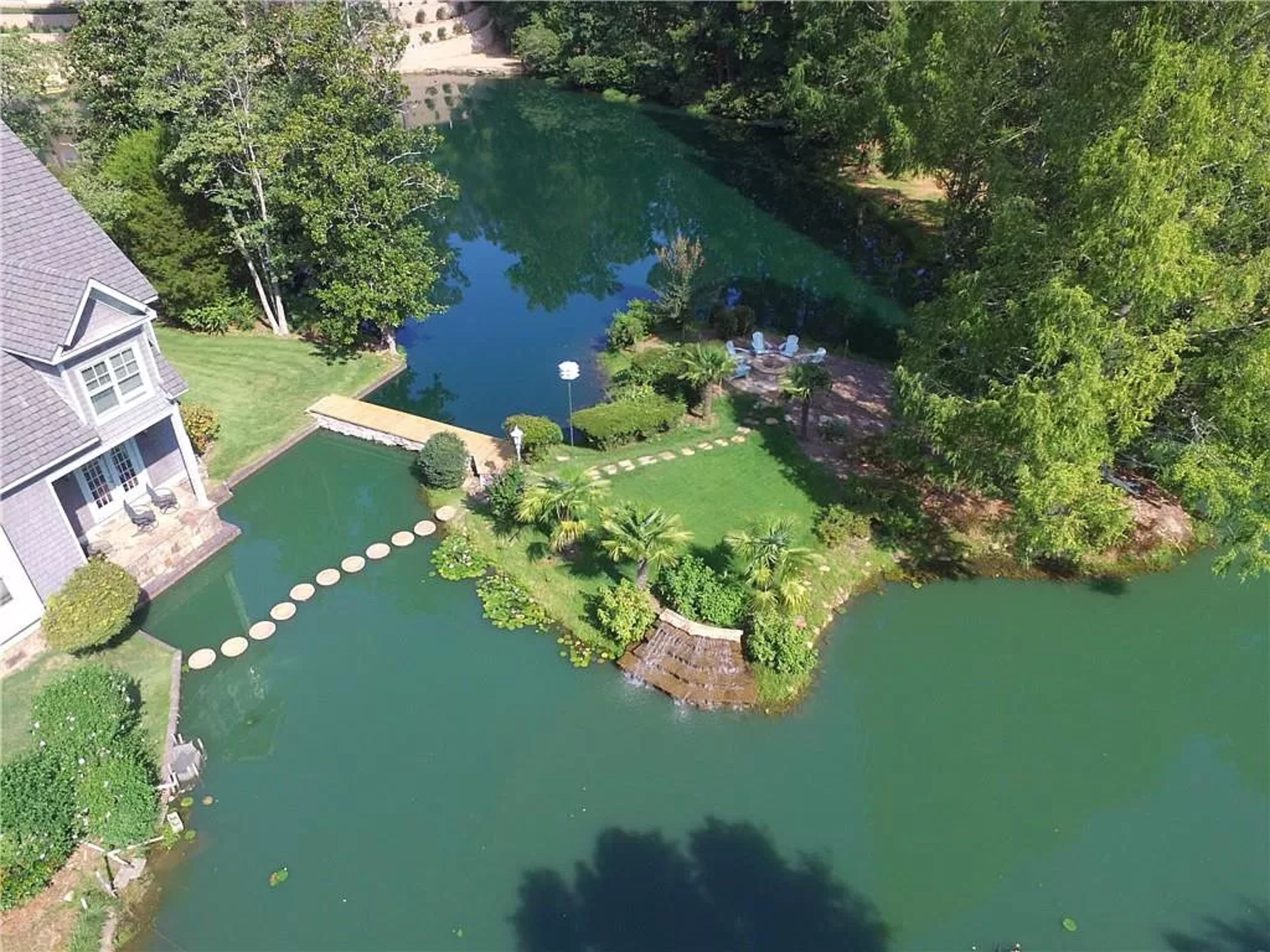 Enjoy total tranquility, stunning views, fishing and canoeing on the private, 7-acre lake; all near Buckhead and Chastain.