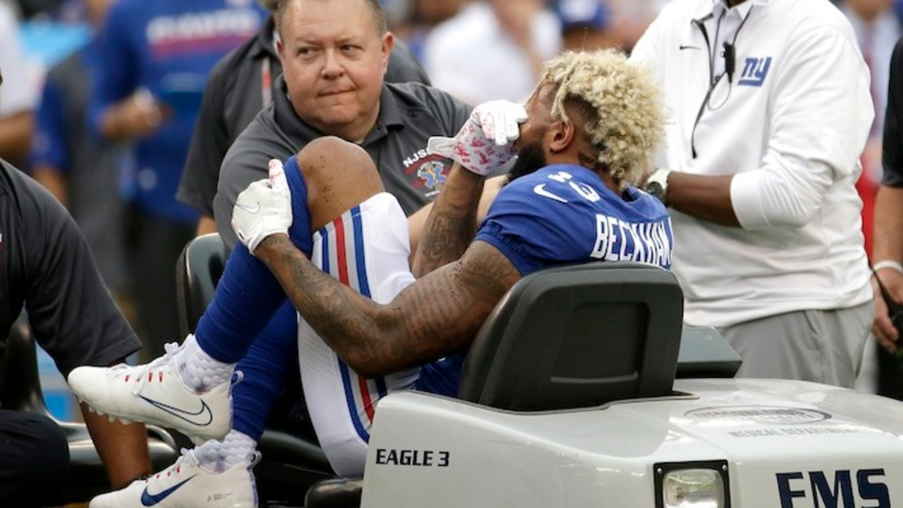 New York Giants wide receiver Odell Beckham is take off the field on a cart after an injury during the second half of an NFL football game against the Los Angeles Chargers, Sunday, Oct. 8, 2017, in East Rutherford, N.J. (AP Photo/Seth Wenig)