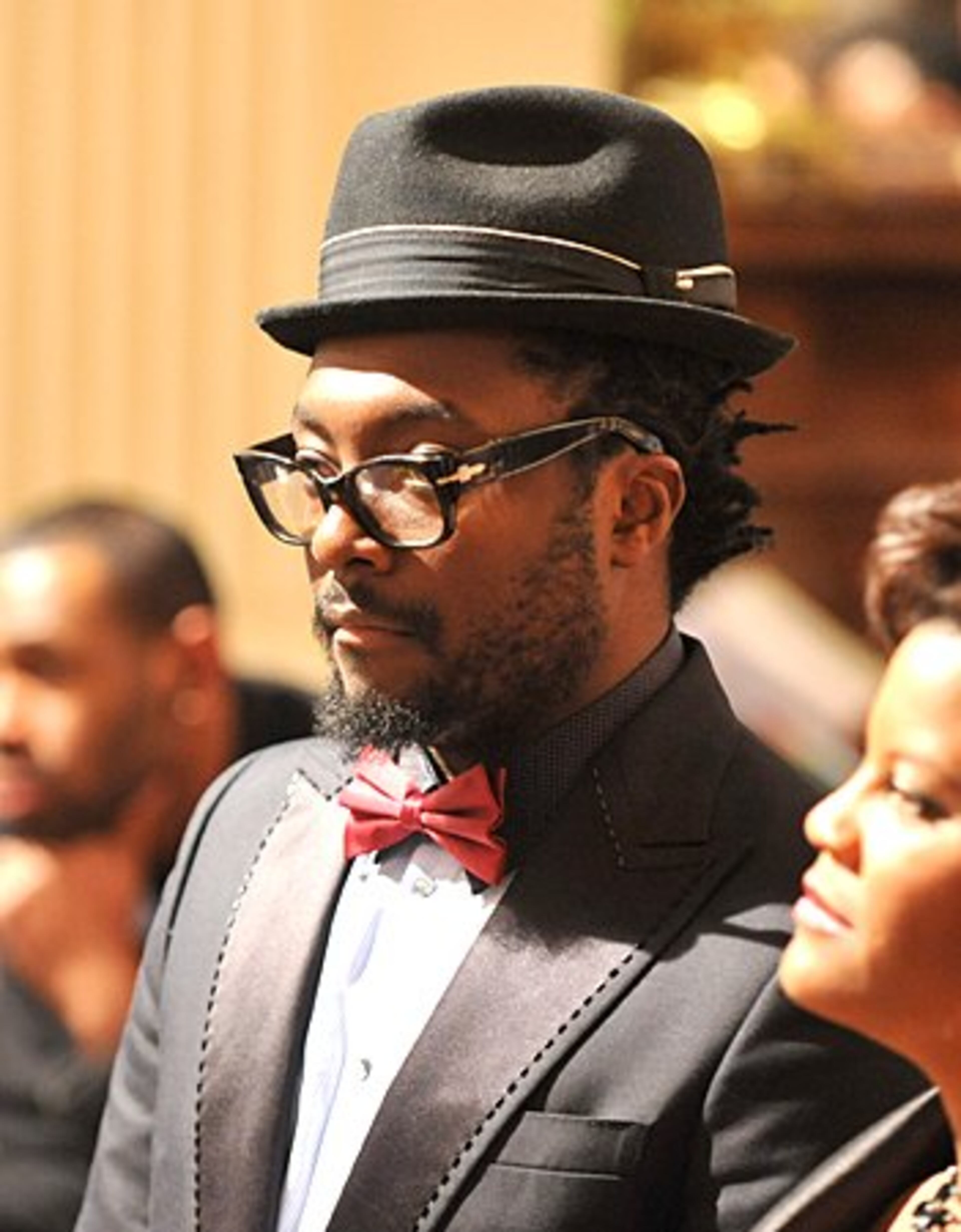 Singer will.i.am looks on as President Barack Obama speaks.