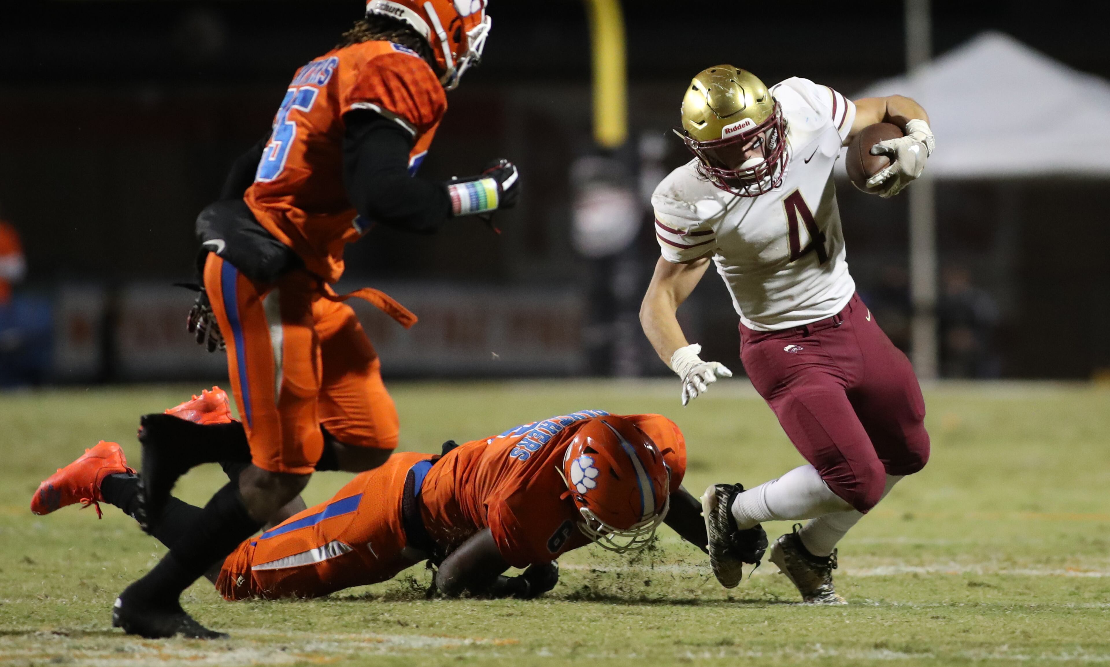 Brookwood running back Eli Khol (4) is tackled by Parkview linebacker Kobe Wilson (6) in the first half at Parkview High School Friday, October 25, 2019 in Lilburn, Ga. (JASON GETZ/SPECIAL TO THE AJC)