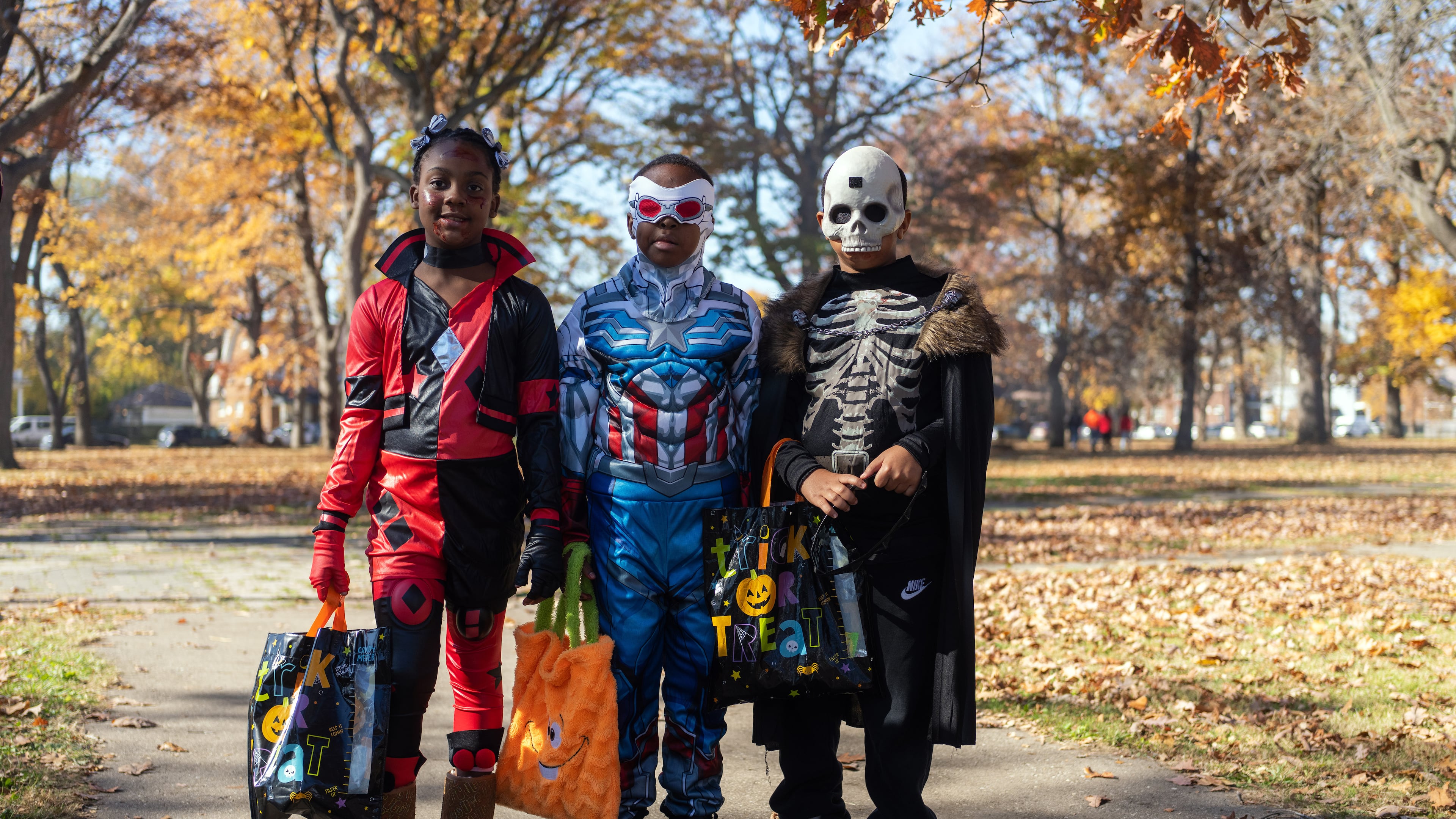 Halloween traditions continue, even as rising candy prices have some households rethinking what they hand out to trick-or-treaters. (Todd Heisler/The New York Times)