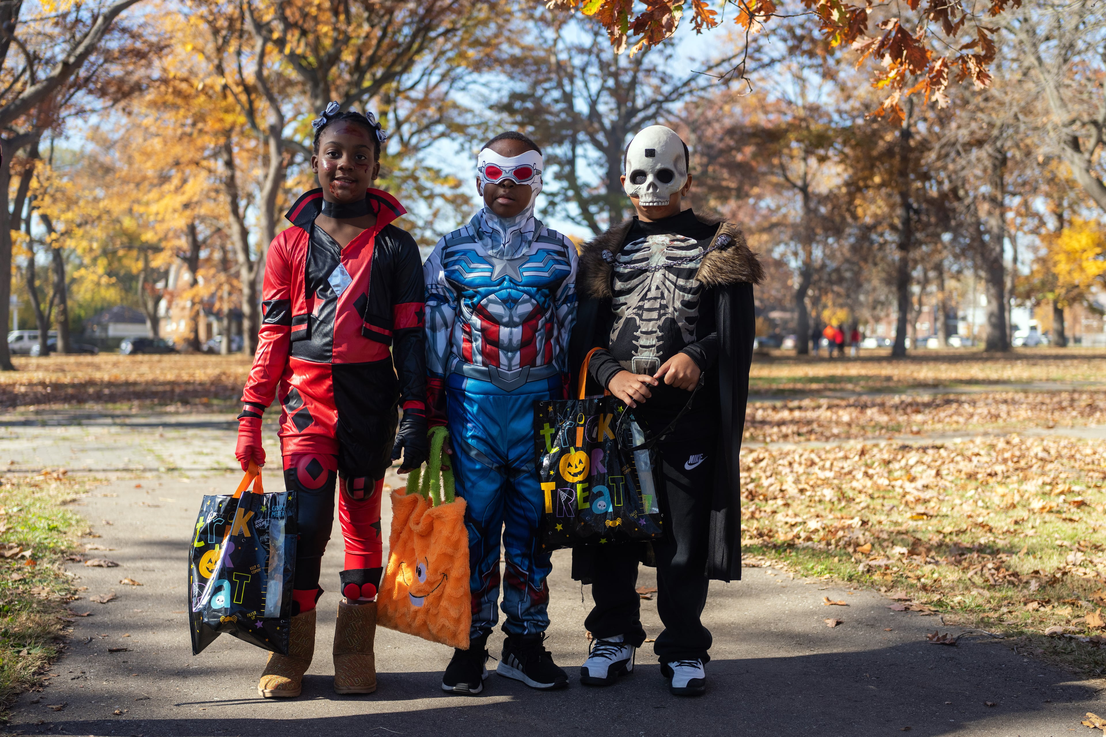 Halloween traditions continue, even as rising candy prices have some households rethinking what they hand out to trick-or-treaters. (Todd Heisler/The New York Times)