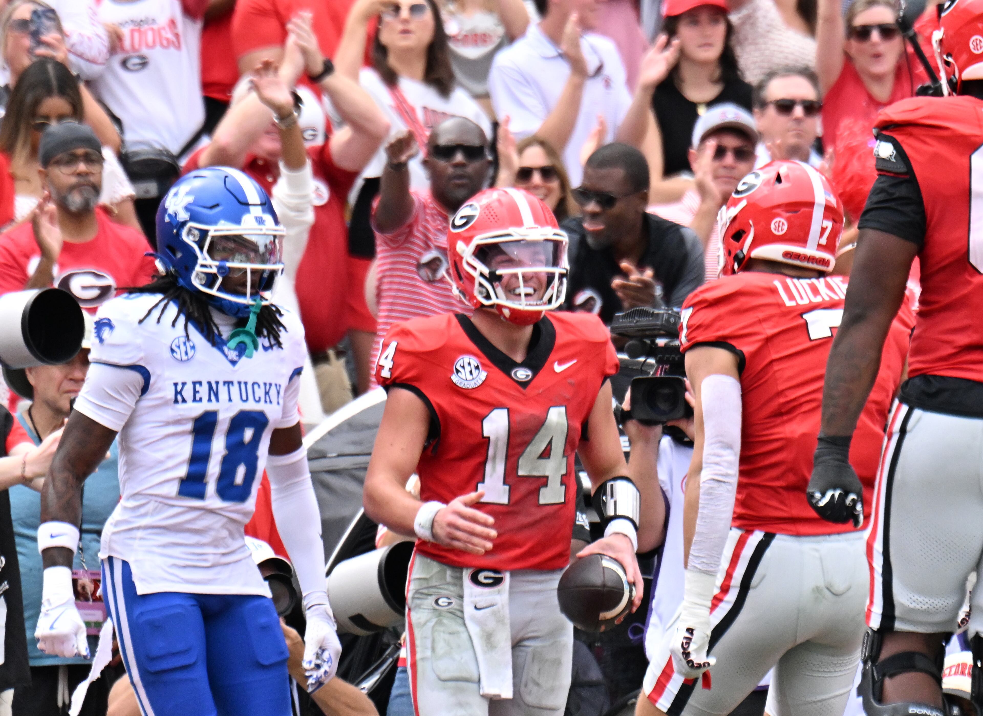 Georgia quarterback Gunner Stockton (14) celebrates after scoring a touchdown during the first half in a NCAA college football game at Sanford Stadium, Saturday, October 4, 2025, in Athens. (Hyosub Shin / AJC)