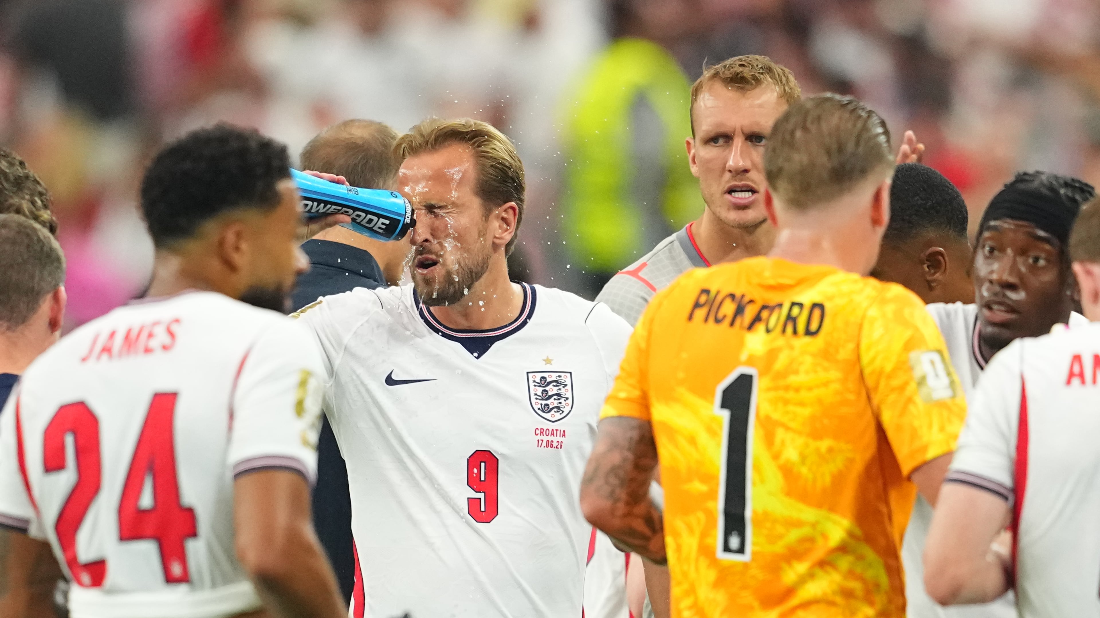 England's Harry Kane (9) cools off during a hydration break of the World Cup Group L soccer match between England and Croatia in Arlington, Texas, near Dallas, Wednesday, June 17, 2026. (AP Photo/Julio Cortez)