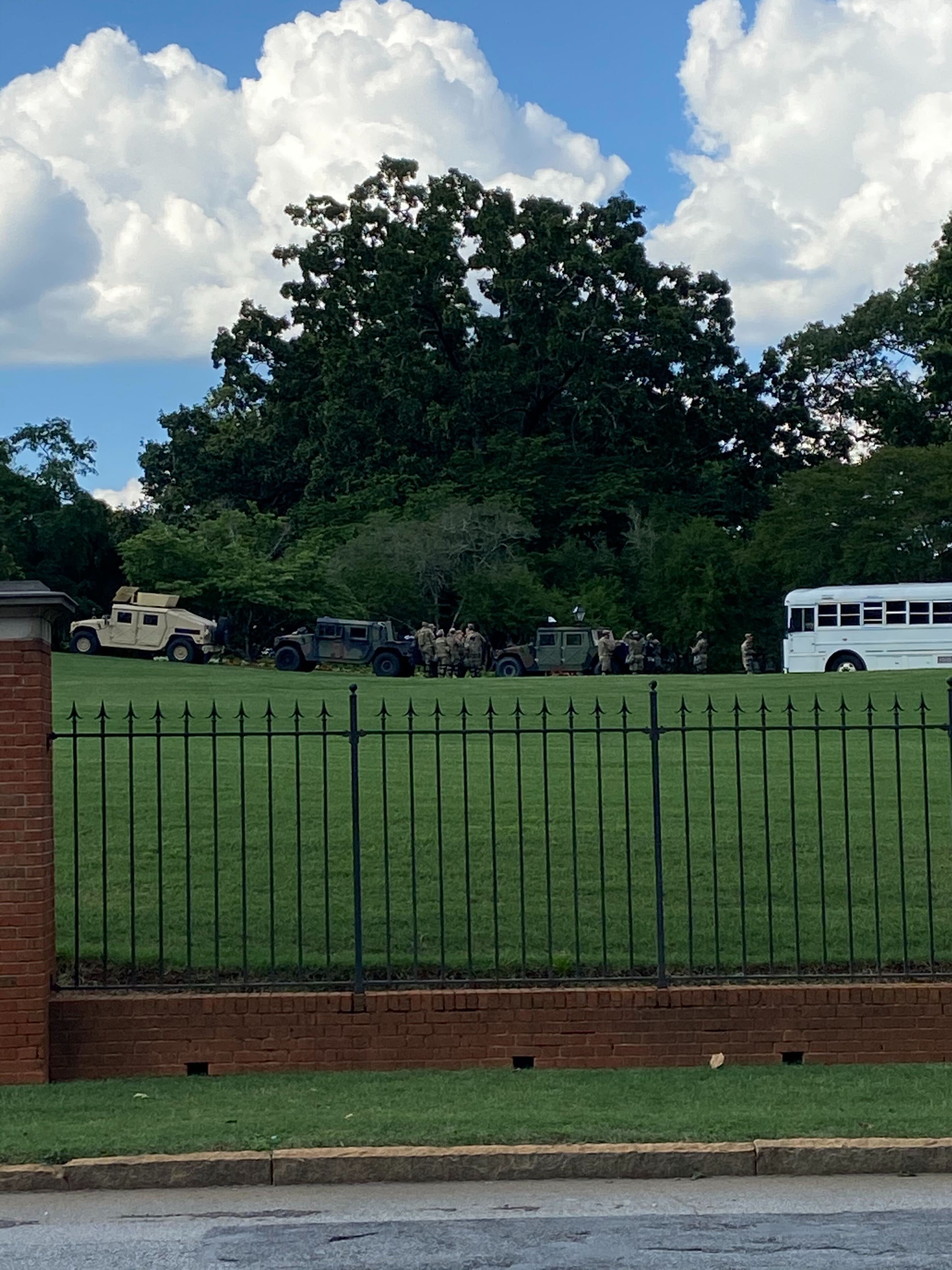Saturday, May 30 -- About a hundred protesters gathered across the street from the Governor's Mansion in Buckhead. AJC Photo: Zachary Hansen