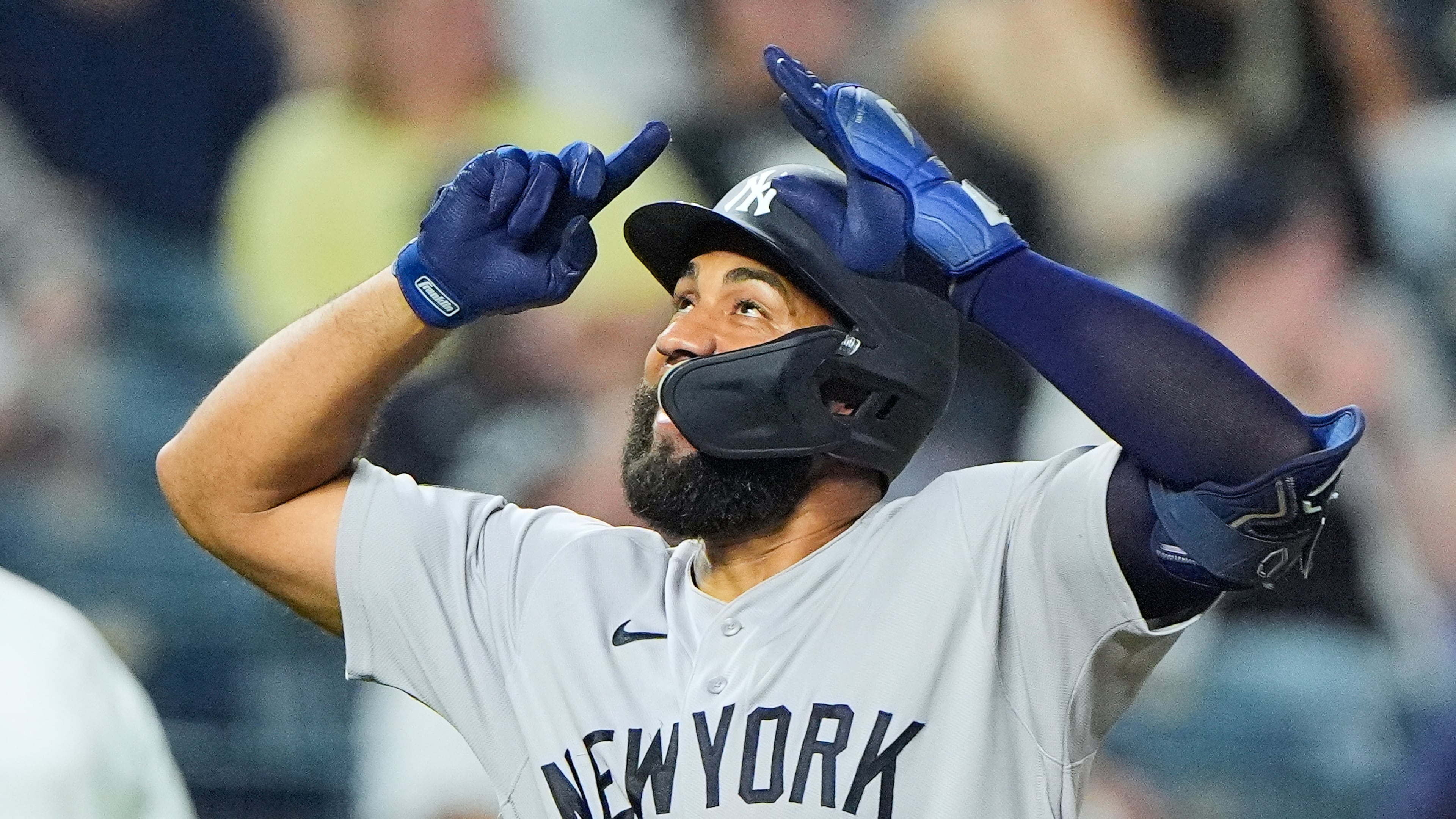 New York Yankees' Amed Rosario celebrates after hitting a two-run home run during the ninth inning of baseball game against the Kansas City Royals, Tuesday, May 26, 2026, in Kansas City, Mo. (AP Photo/Charlie Riedel)