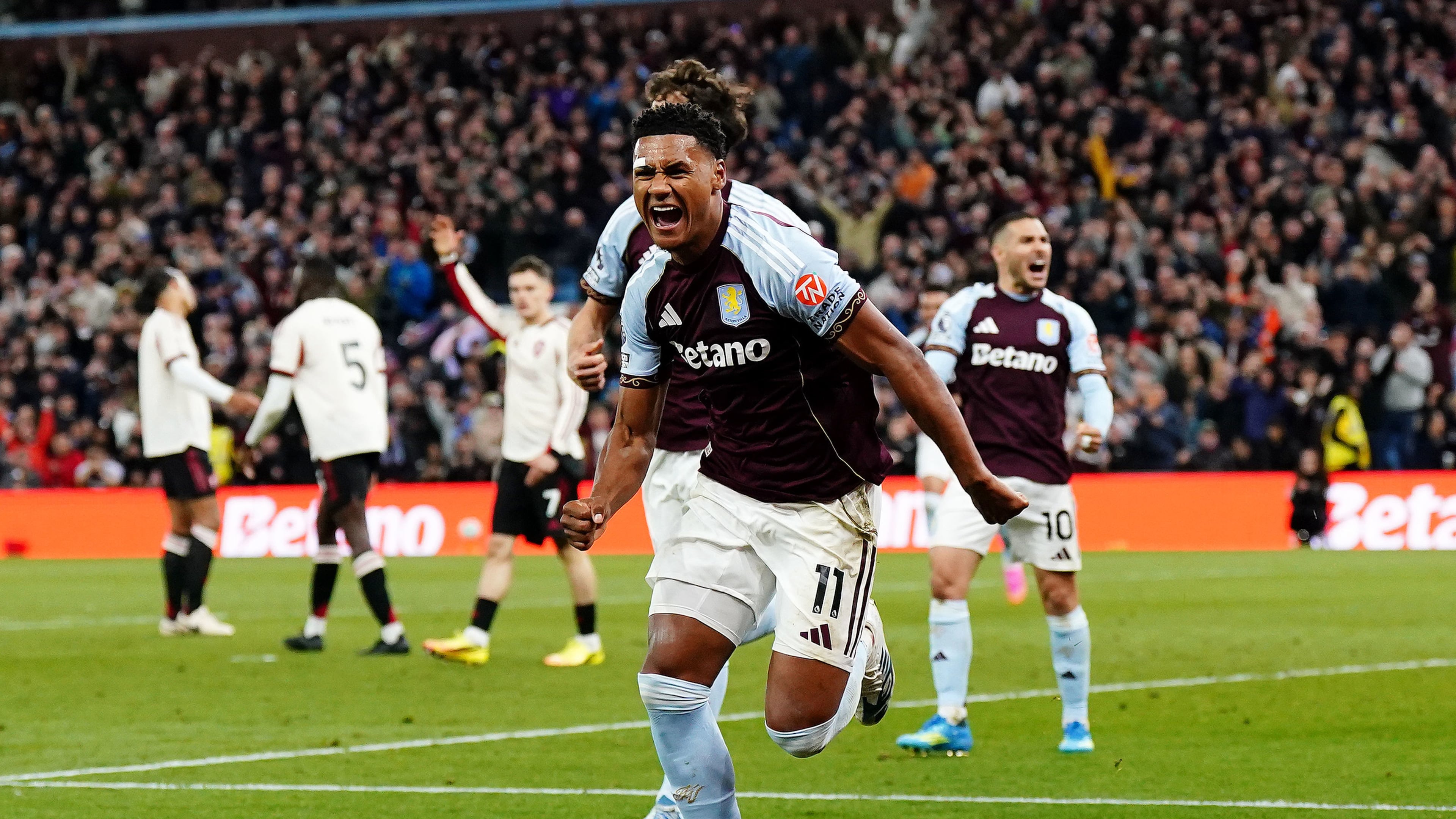 Aston Villa's Ollie Watkins celebrates scoring their side's third goal during the English Premier League soccer match between Aston Villa and Liverpool in Birmingham, England, Friday, May 15, 2026. (Jacob King/PA via AP)