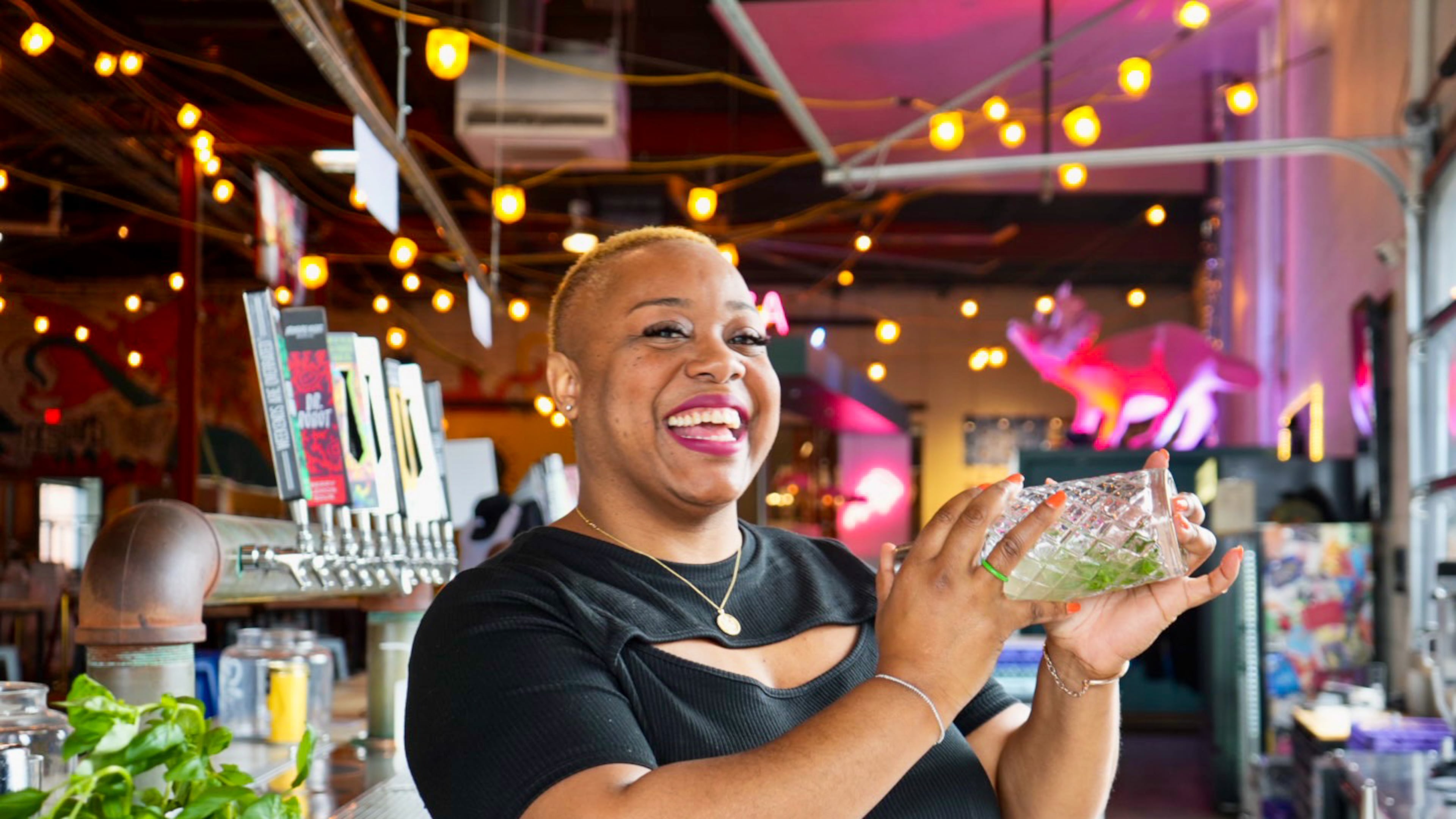 Acclaimed mixologist Tiffanie Barriere, aka the Drinking Coach, seen here mixing cocktails at Monday Night Brewing. Barriere was miffed when she moved to Atlanta around 2000 only to find that Juneteenth was not celebrated with the same enthusiasm as in her native region of South Texas and Western Louisiana. (Courtesy of Monday Night Brewing)