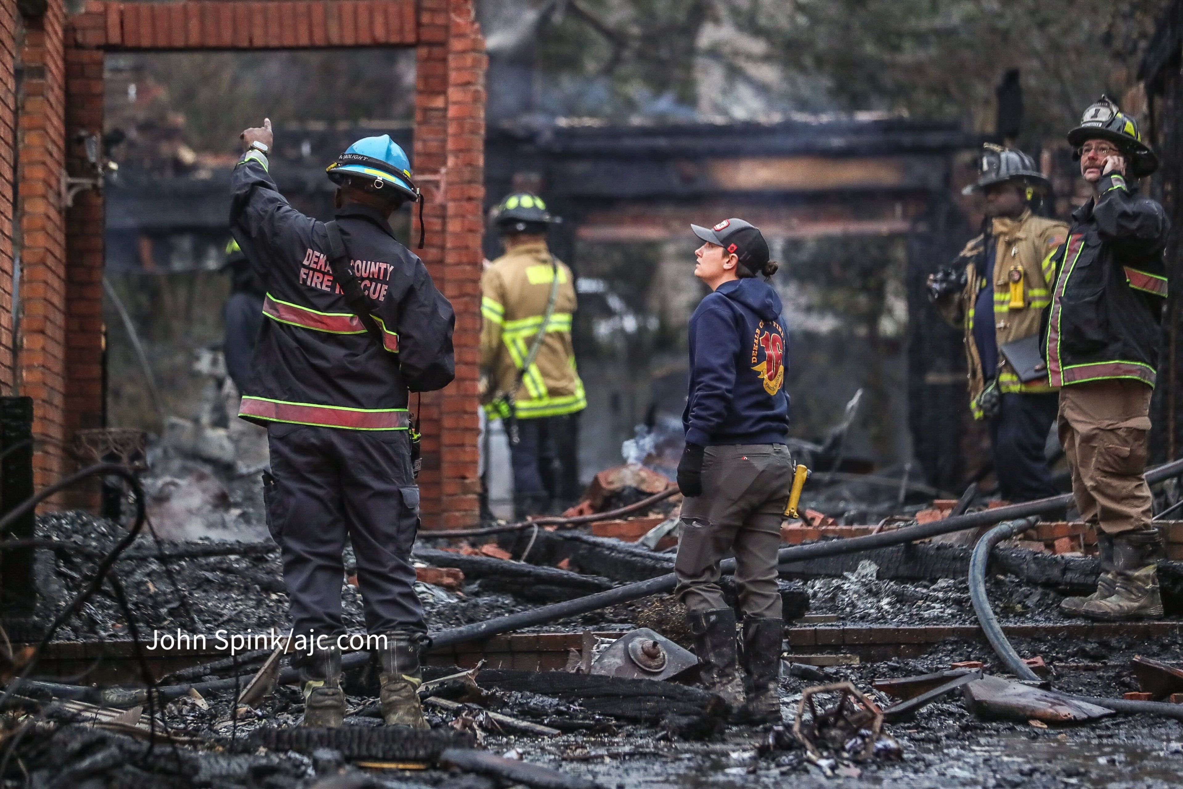 A massive fire engulfed three houses in a Brookhaven subdivision early Friday morning.