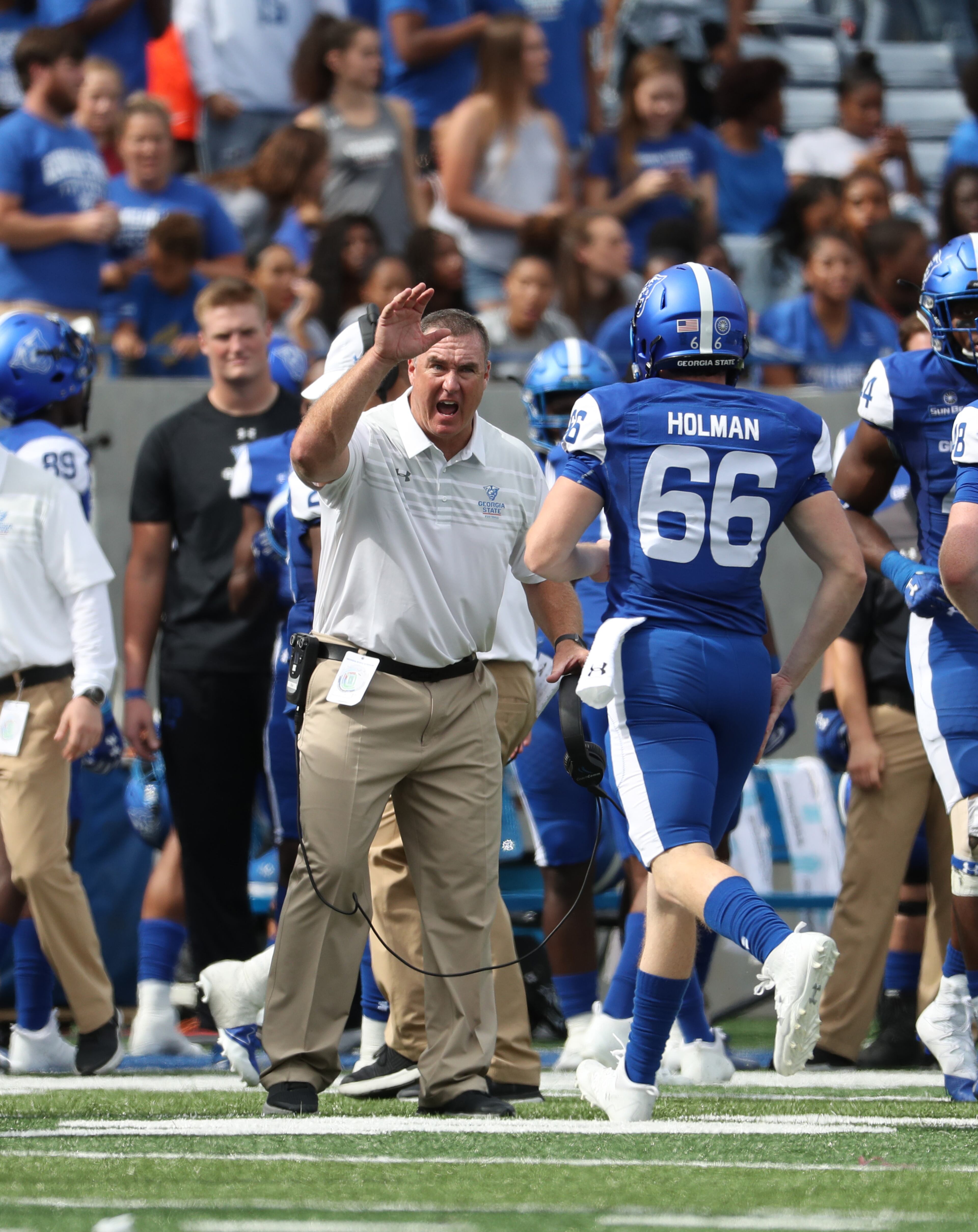 October 21, 2017 - Atlanta, Ga: Georgia State Panthers head coach Shawn Elliott talks to long snapper Seth-Patrick Holman (66) in the first quarter of their game against the Troy Trojans at GSU Stadium Saturday, October 21, 2017, in Atlanta.. PHOTO / JASON GETZ