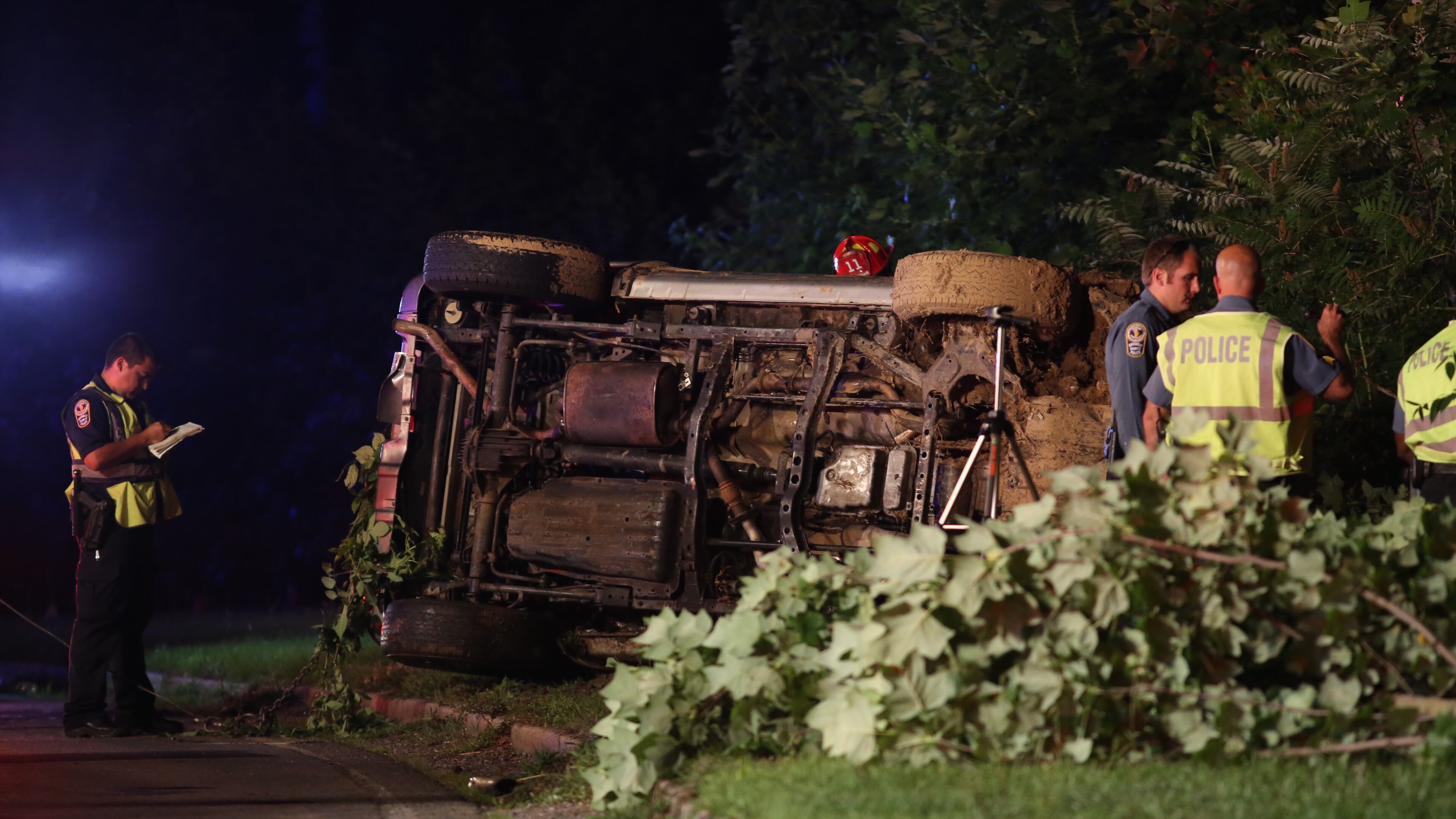 Gwinnett County authorities were on the scene after a car was found submerged in a marshy pond on Thursday, June 11, 2015. (BEN GRAY / BGRAY@AJC.COM)