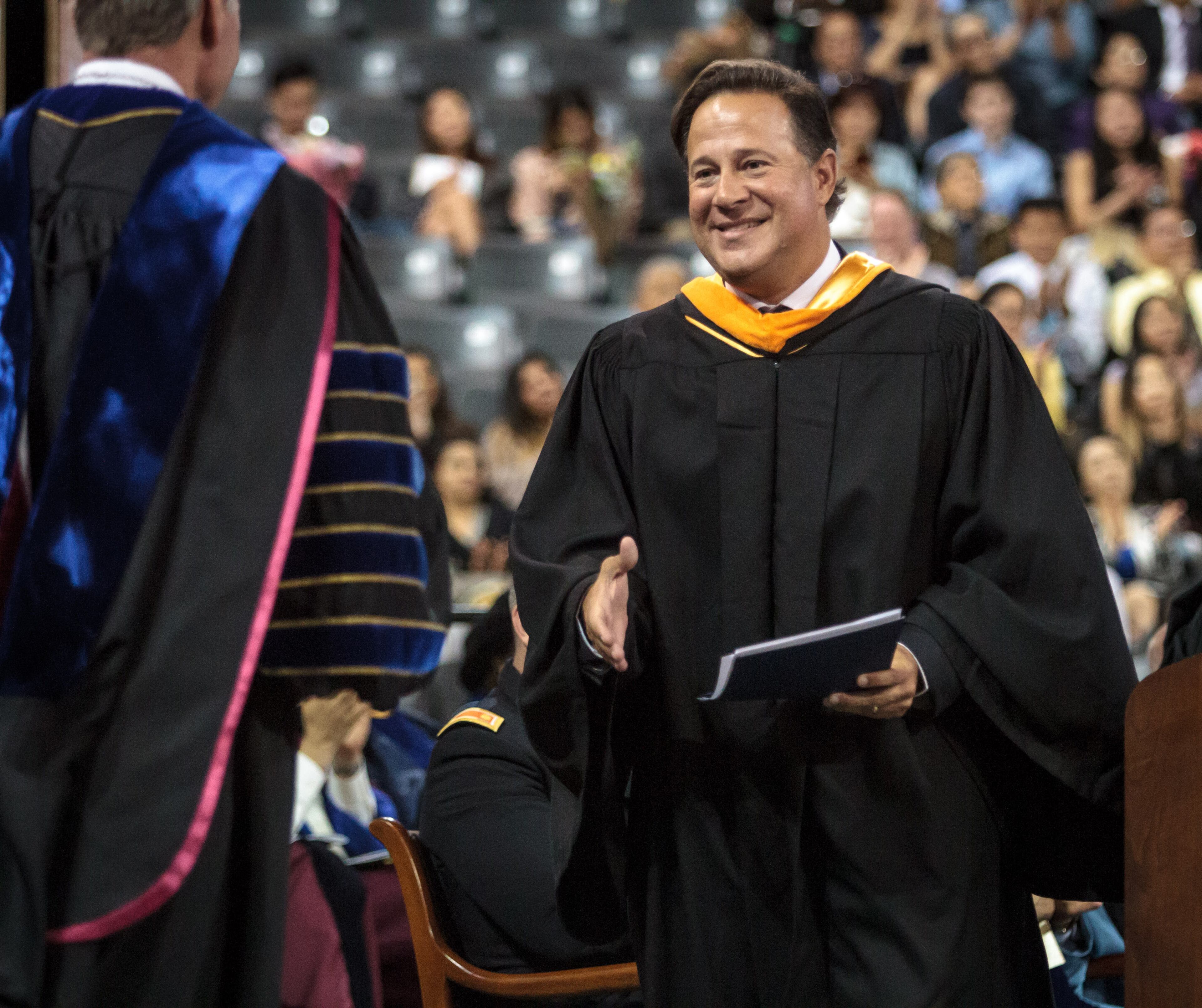 Panamanian president Juan Carlos Varela (R) shakes hands with Georgia Institute of Technology's president Dr. G. P. "Bud" Peterson after Varela gave his commencement speech during the morning graduation ceremonies at McCamish Pavilion Saturday, May. 6 2017. STEVE SCHAEFER / SPECIAL TO THE AJC