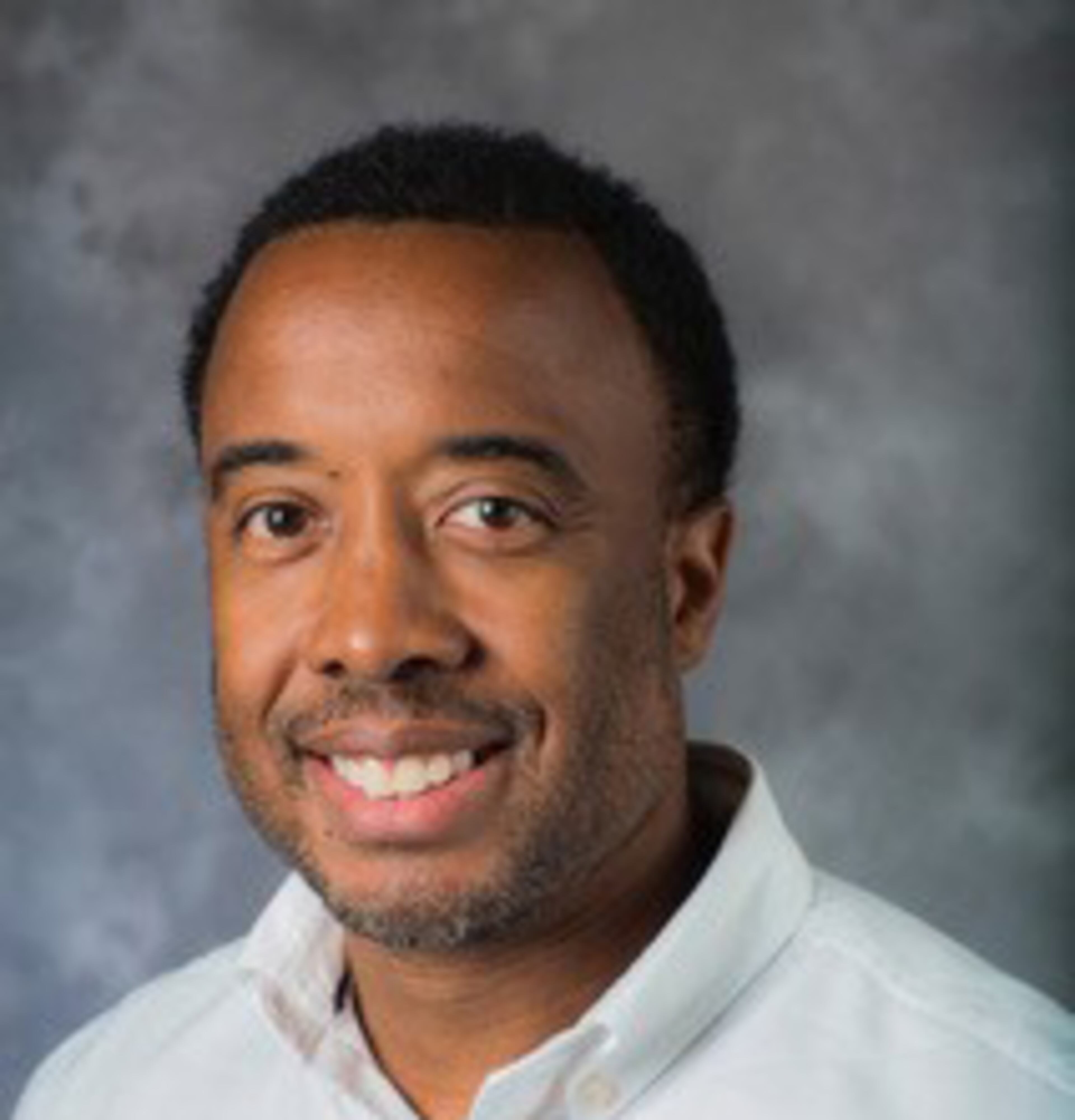 Dr. John E. Lewis Jr.