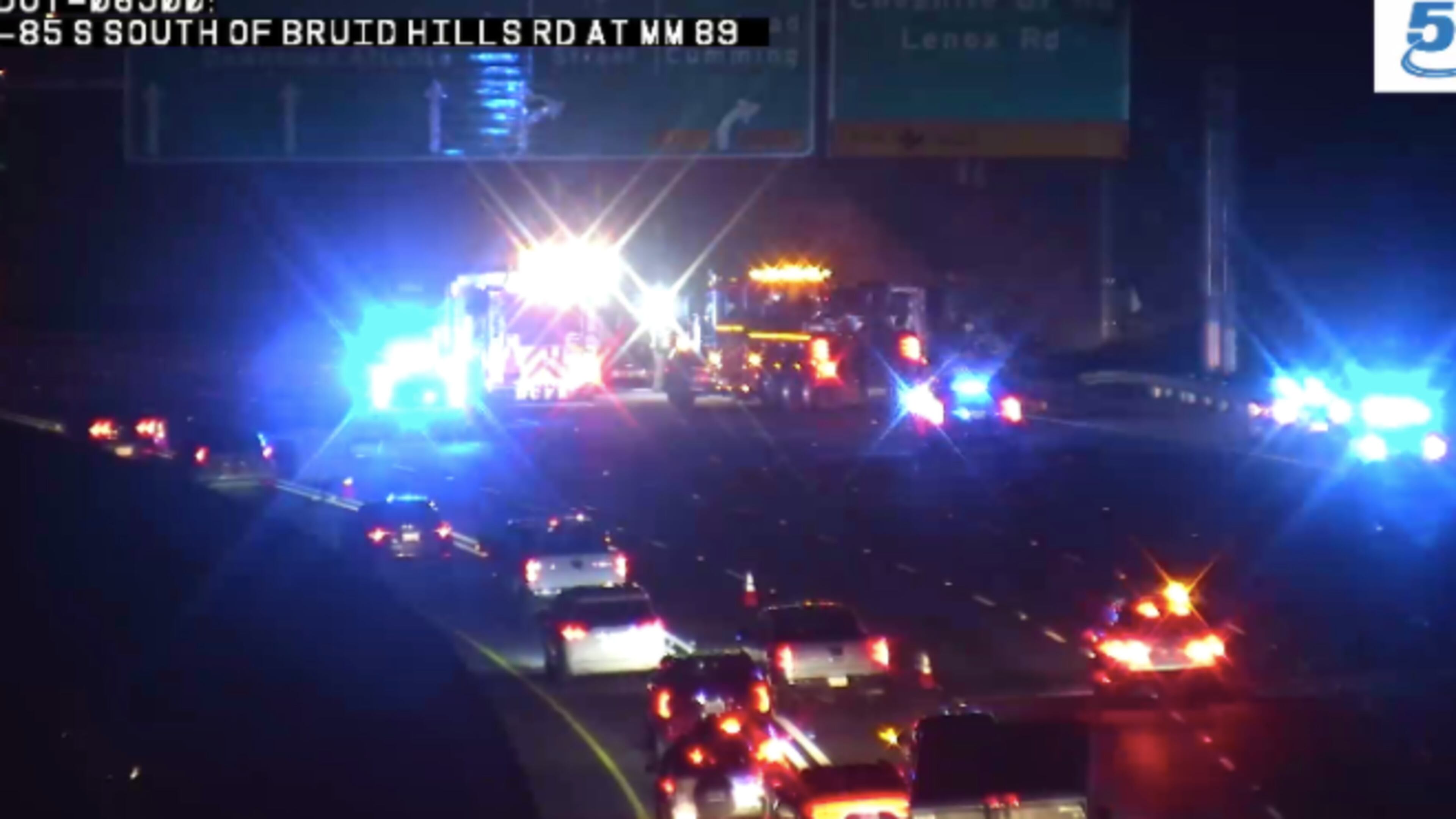 The moving truck overturned on I-85 near the Cheshire Bridge Road exit.