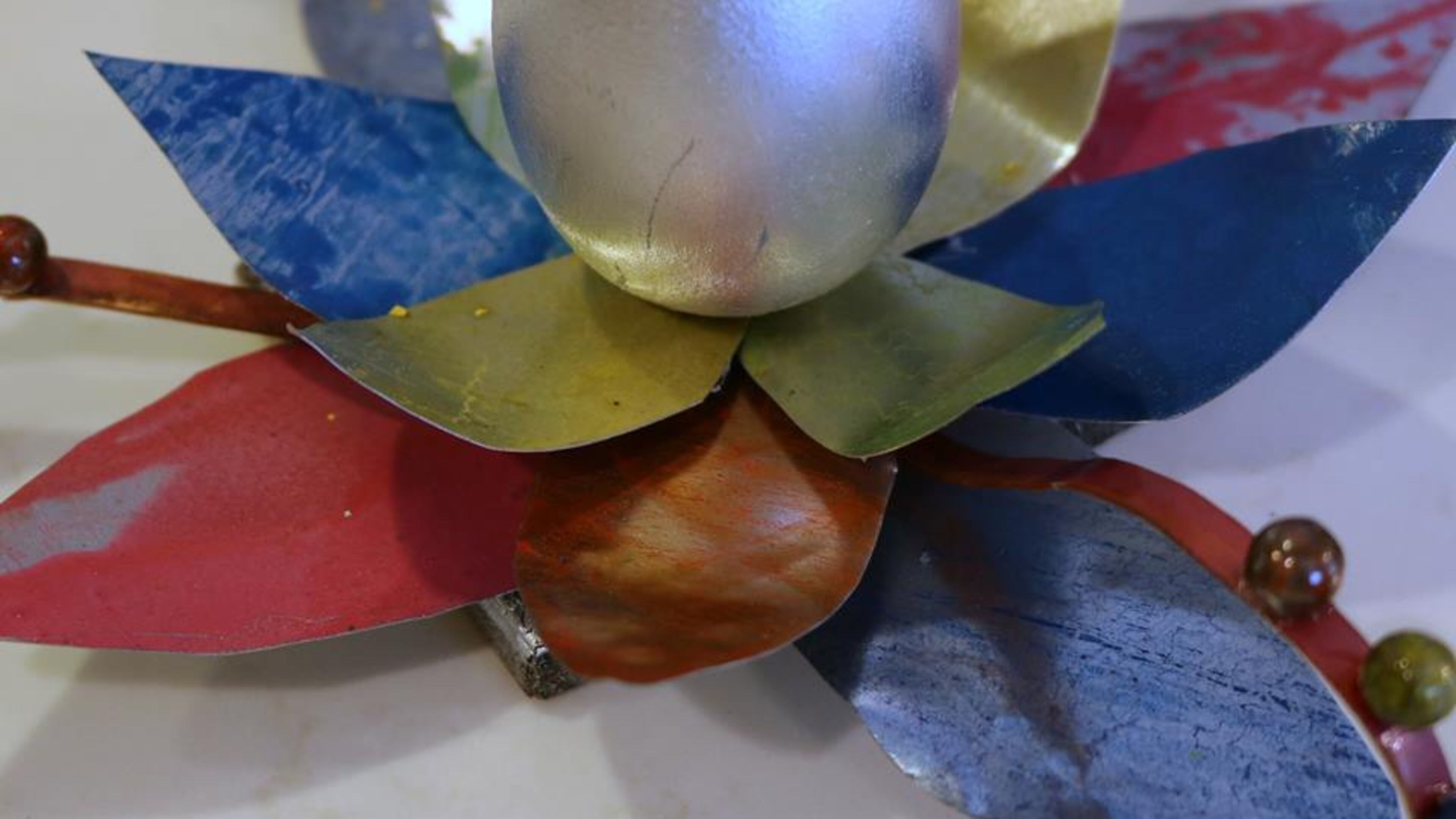 This gorgeous, one of a-kind-egg is entitled, “You Will Arrive At Nirvana All Shiny and Chrome”and this one will be up for grabs at this year’s upcoming artful Easter egg hunt.