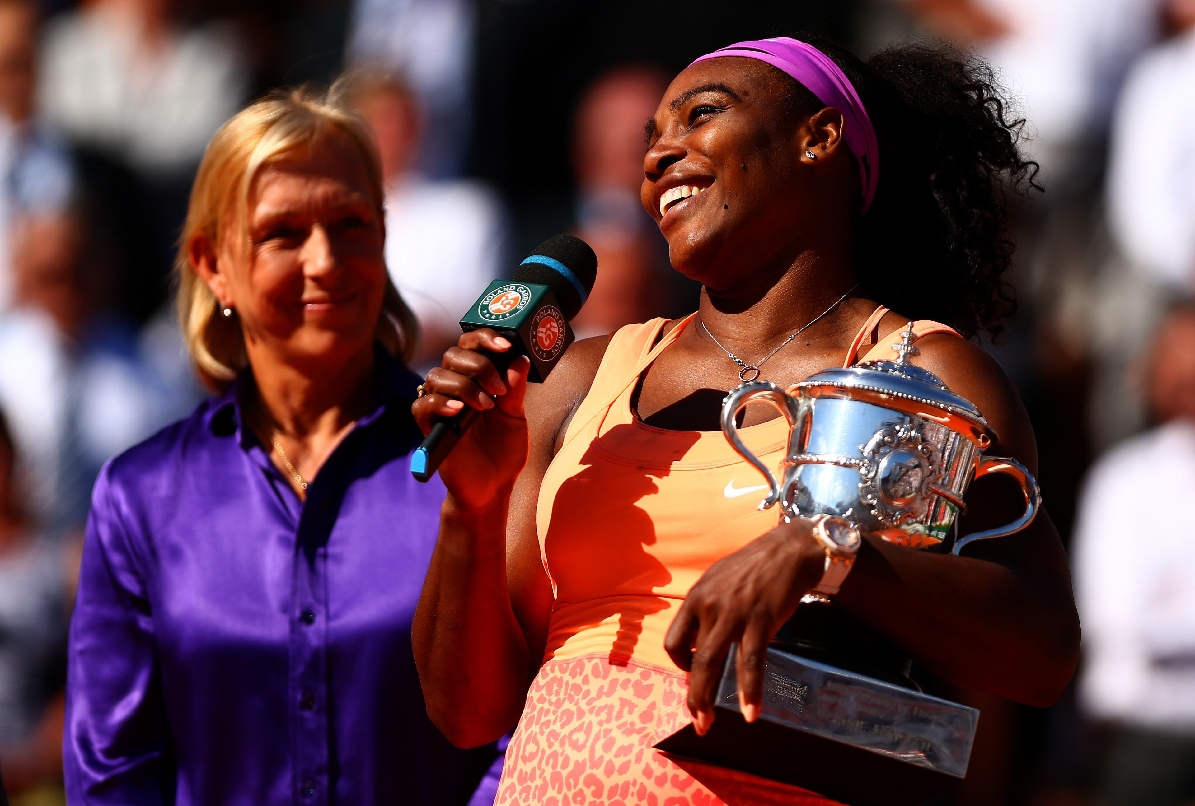 Serena Williams of the United States speaks to the crowd after being presented with the Coupe Suzanne Lenglen trophy by Martina Navratilova after winning the Women's Singles Final against Lucie Safarova of Czech Repbulic on day fourteen of the 2015 French Open at Roland Garros on June 6, 2015 in Paris, France. (Photo by Dan Istitene/Getty Images)