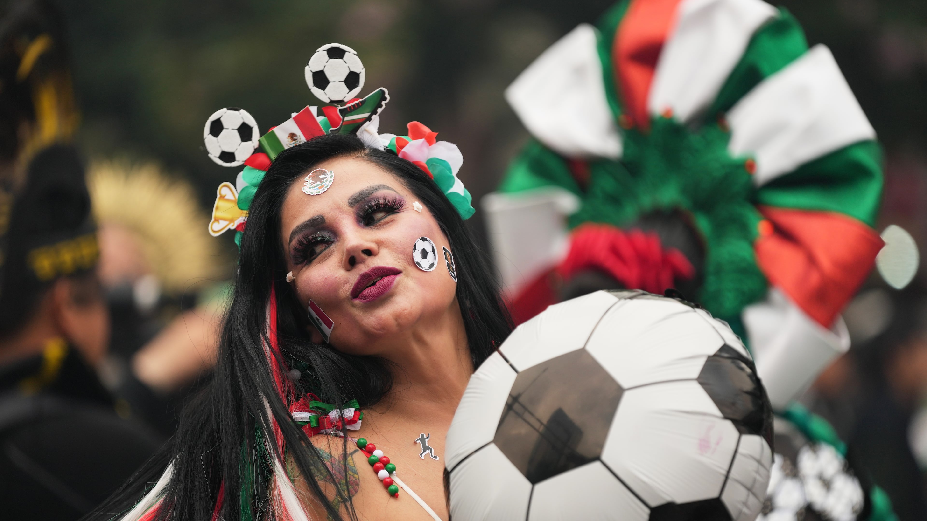 A dancer performs along Reforma Avenue in Mexico City, Saturday, June 6, 2026 ahead of the FIFA World Cup. (AP Photo/Moises Castillo)