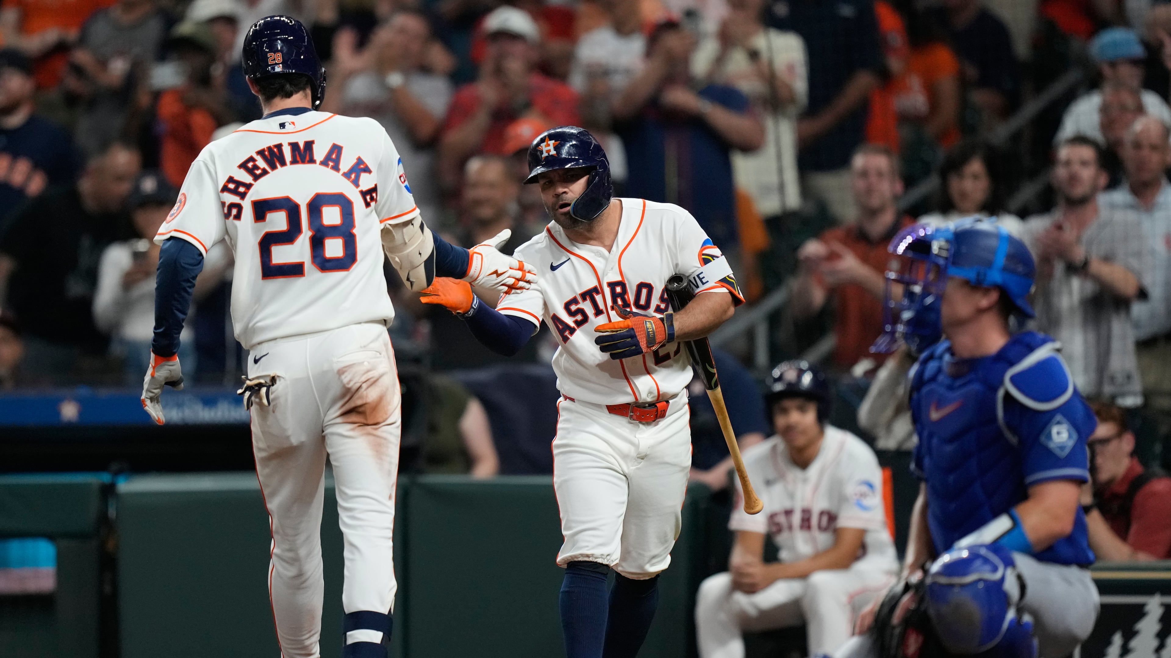 Houston Astros' Braden Shewmake (28) celebrates with Jose Altuve after hitting a home run during the third inning of a baseball game against the Los Angeles Dodgers in Houston, Tuesday, May 5, 2026. (AP Photo/Ashley Landis)