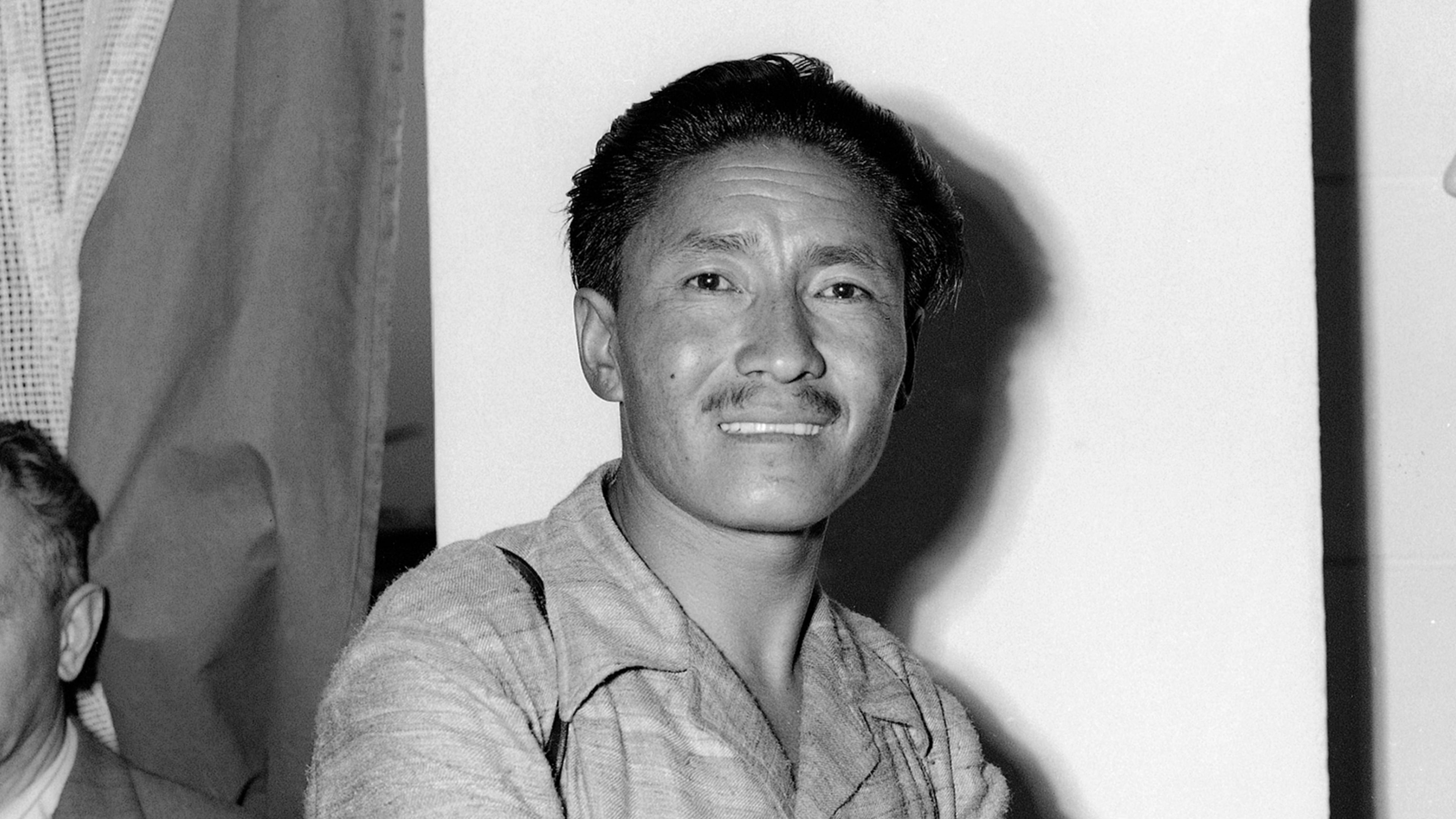 FILE - Sherpa Tenzing Norgay appears at the Ciampino Airport in Rome, Italy during a stopover on July 2, 1953. (AP Photo/James Pringle, File)