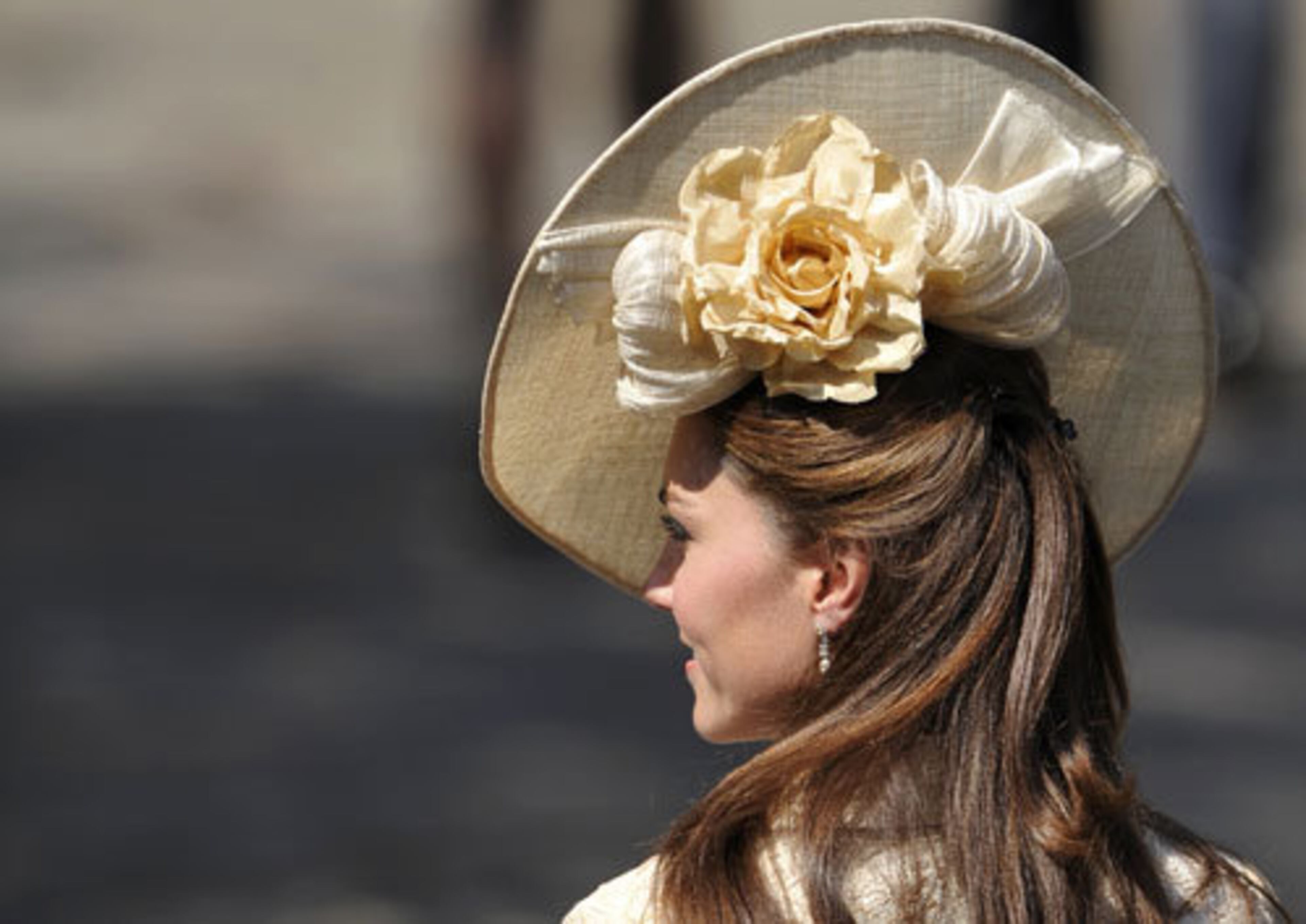 A closer view of Kate's hat reveals a floral adornment.