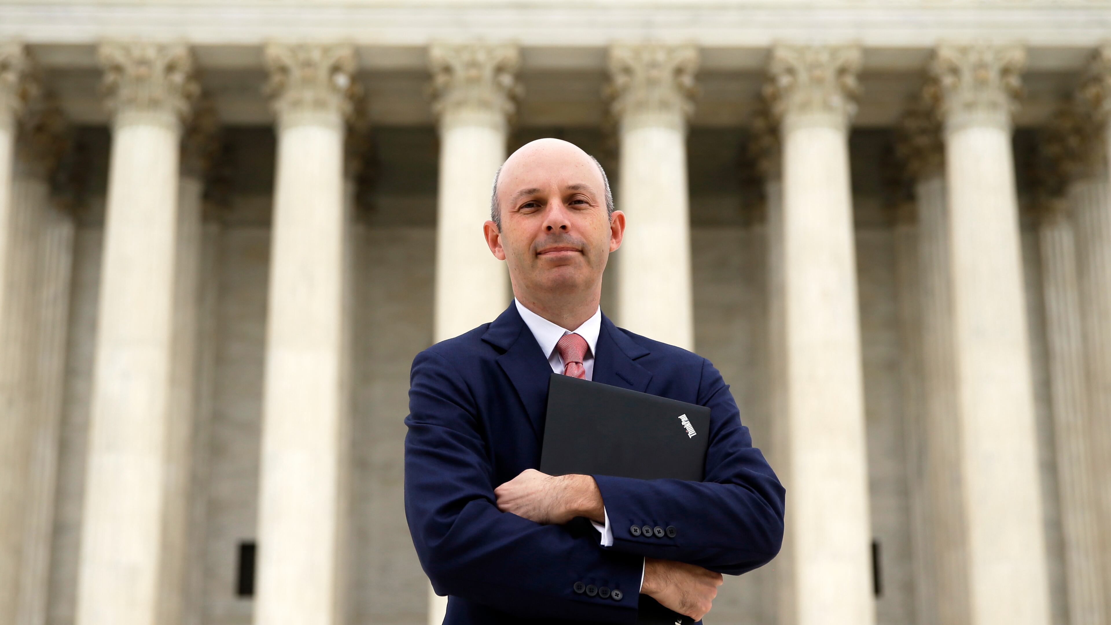 FILE - Tom Goldstein, who writes SCOTUSblog.com, poses for a photograph in front of the Supreme Court, Oct. 31, 2013, in Washington. (AP Photo/Alex Brandon, File)