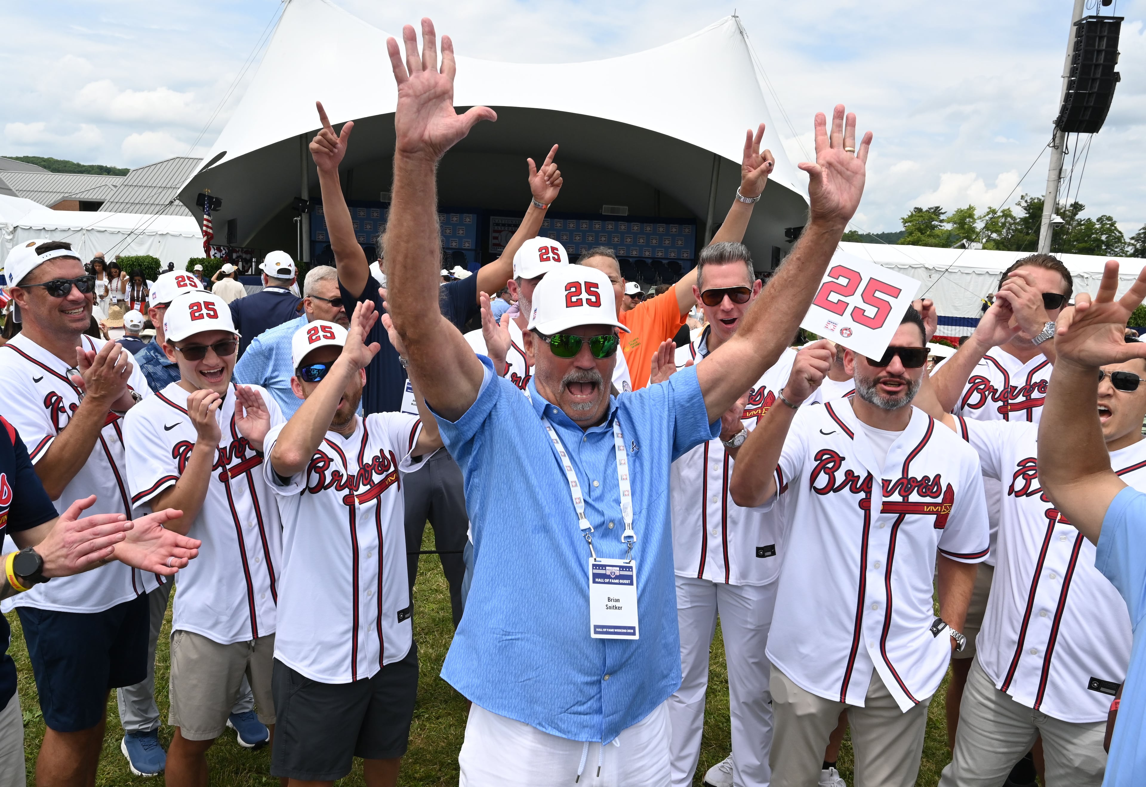 Former Atlanta Braves manager Brian Snitker fires up Braves fans before the 2026 National Baseball Hall of Fame Induction Ceremony at the Clark Sports Center on Sunday, July 26, 2026, in Cooperstown, N.Y. Braves centerfielder Andruw Jones is set for induction into the National Baseball Hall of Fame as part of the Class of 2026, alongside Carlos Beltrán and Jeff Kent. (Hyosub Shin/AJC)