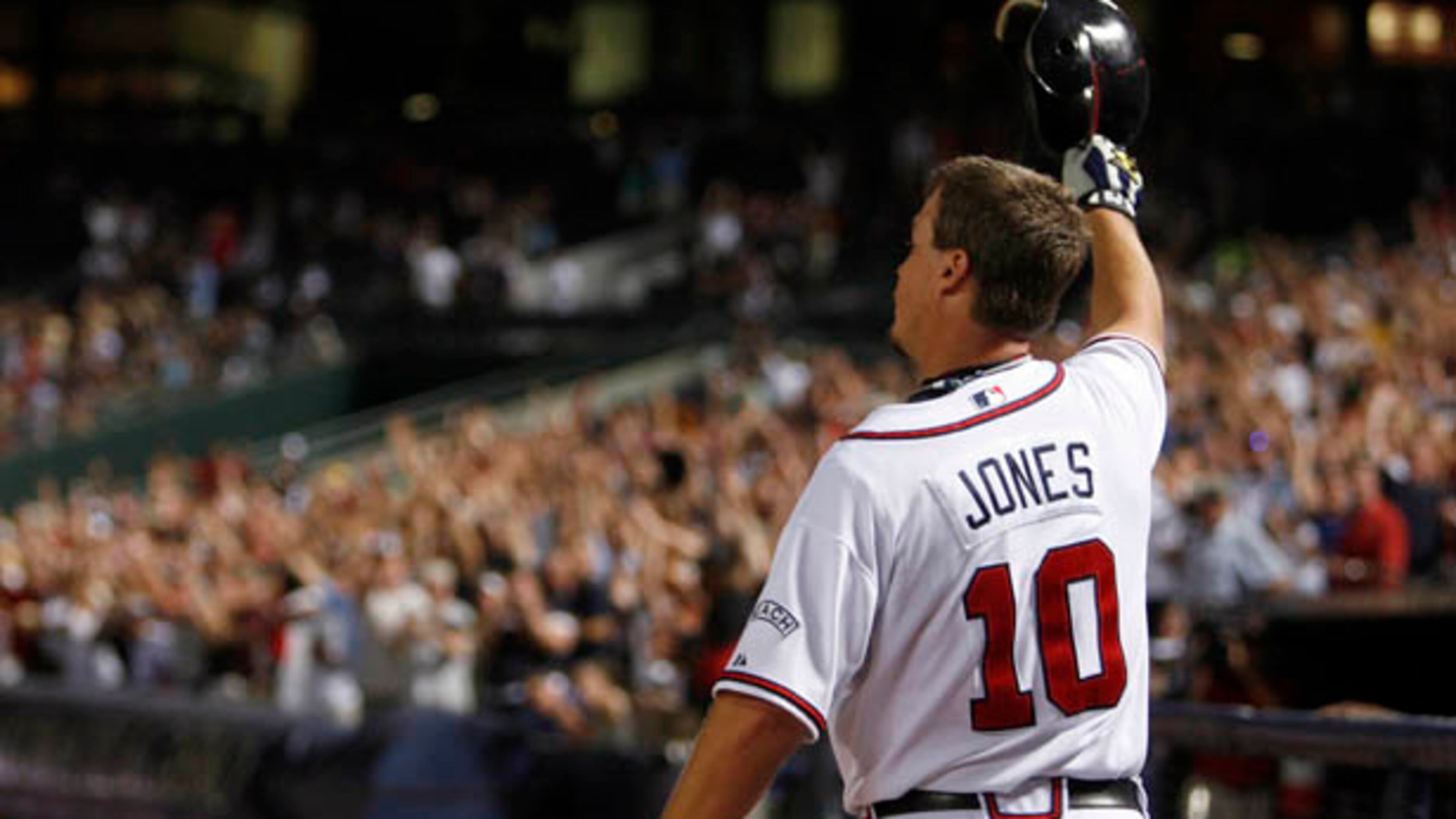 Braves' third baseman Chipper Jones acknowledges the crowd after hitting the 400th home run of his career in the 6th inning of their game against the Florida Marlins at Turner Field June 5, 2008.