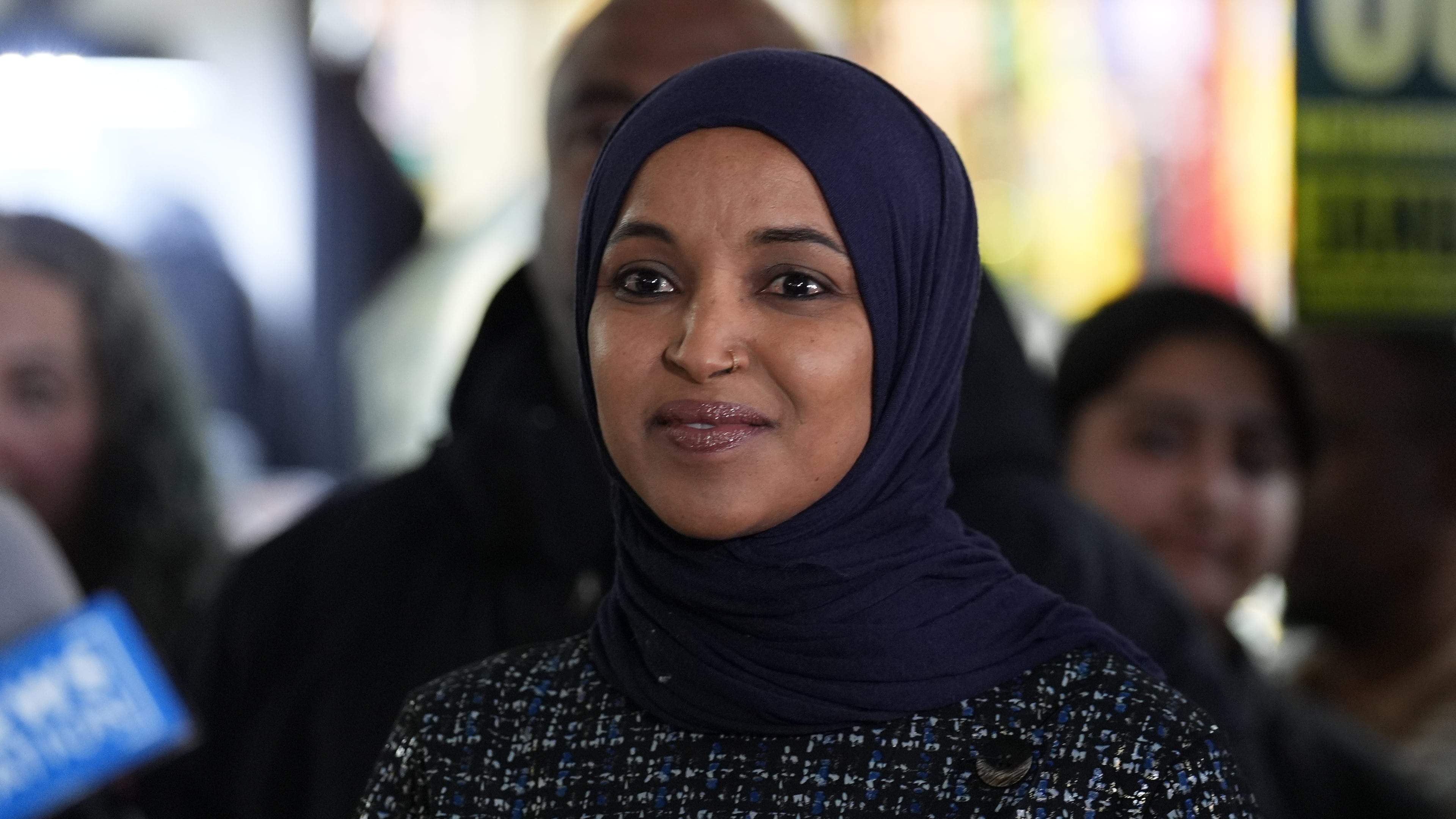Rep. Ilhan Omar, D-Minn., stands during a press conference on Wednesday, Jan. 28, 2026, in Minneapolis. (AP Photo/Adam Gray)