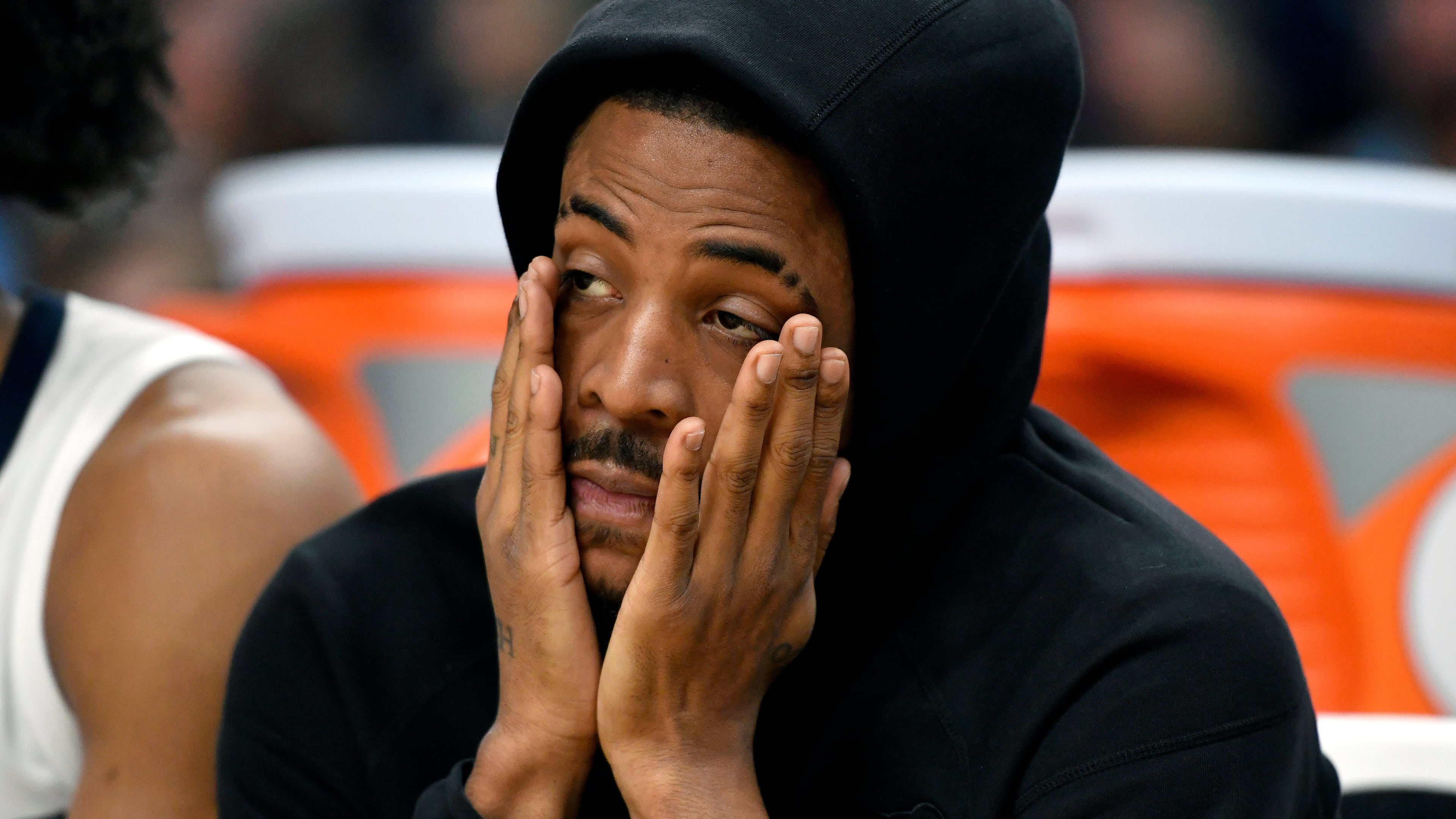 Memphis Grizzlies guard Ja Morant looks on from the bench in the second half of an NBA basketball game against the Phoenix Suns Wednesday, Jan. 7, 2026, in Memphis, Tenn. (AP Photo/Brandon Dill)