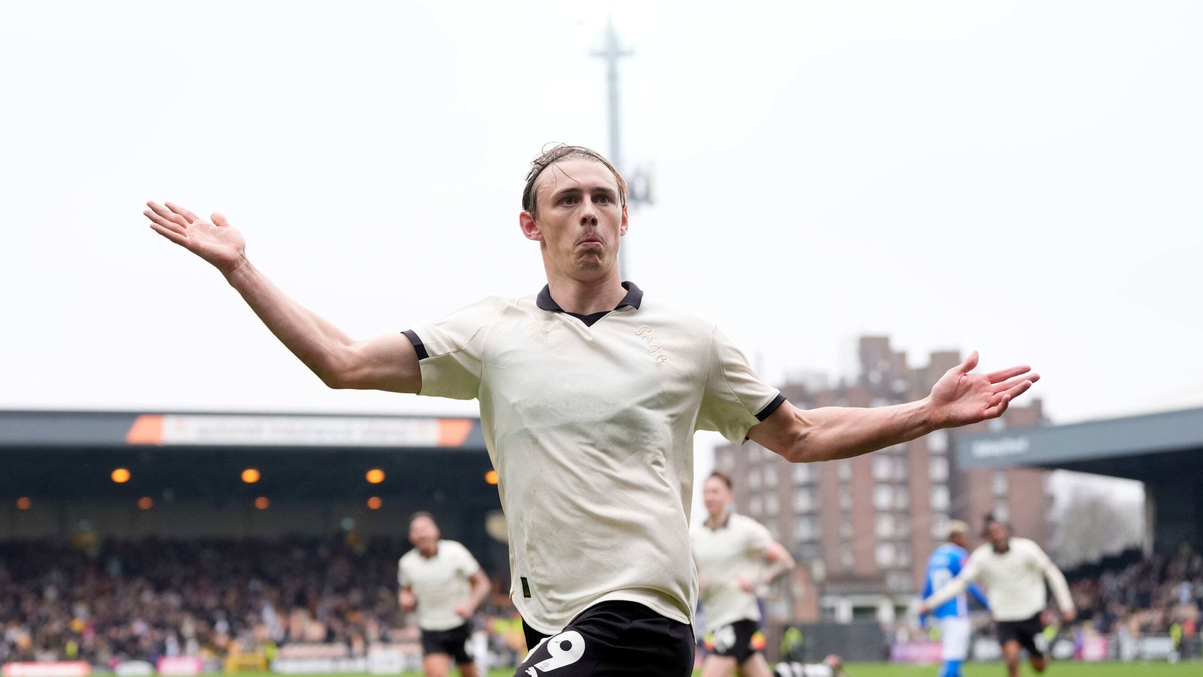 Port Vale's Ben Waine celebrates after scoring his side's first goal of the game during the FA Cup fifth round soccer match between Sunderland and Port Vale, in Stoke on Trent, England, Sunday March 8, 2026. (Nick Potts/PA via AP)