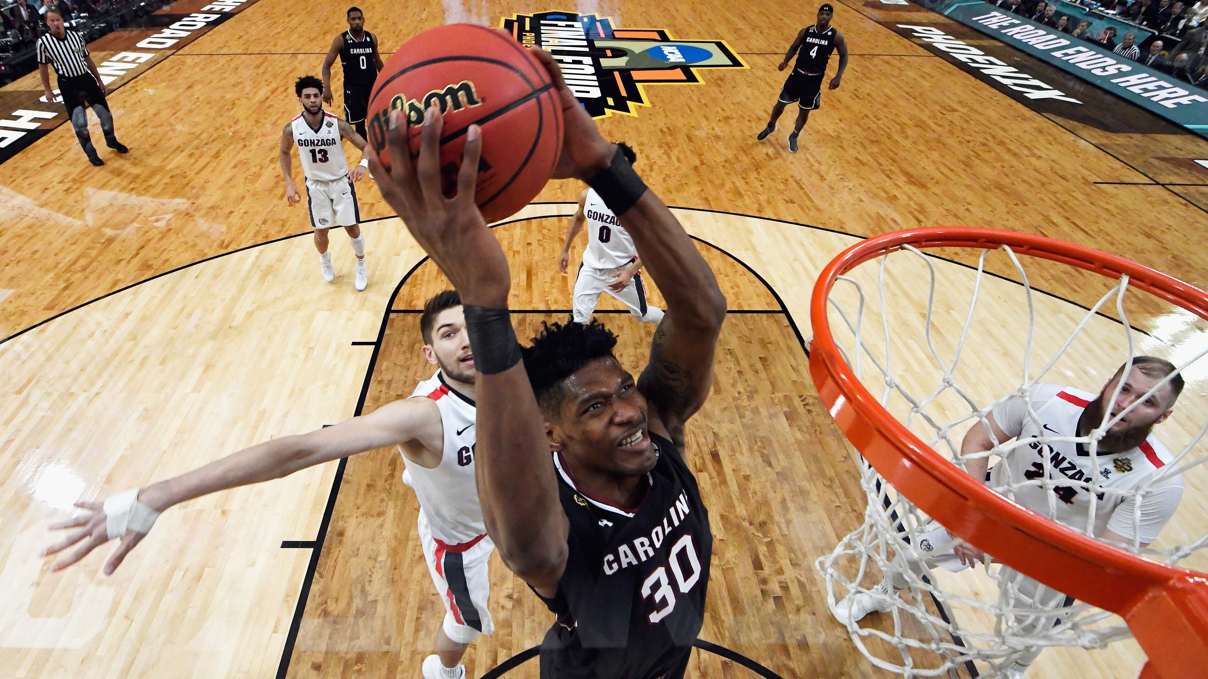 Chris Silvaof the South Carolina Gamecocks goes up for a dunk in the first half against the Gonzaga Bulldogs during the 2017 NCAA Men's Final Four Semifinal at University of Phoenix Stadium on April 1, 2017 in Glendale, Arizona. (Photo by Chris Steppig - Pool/Getty Images)