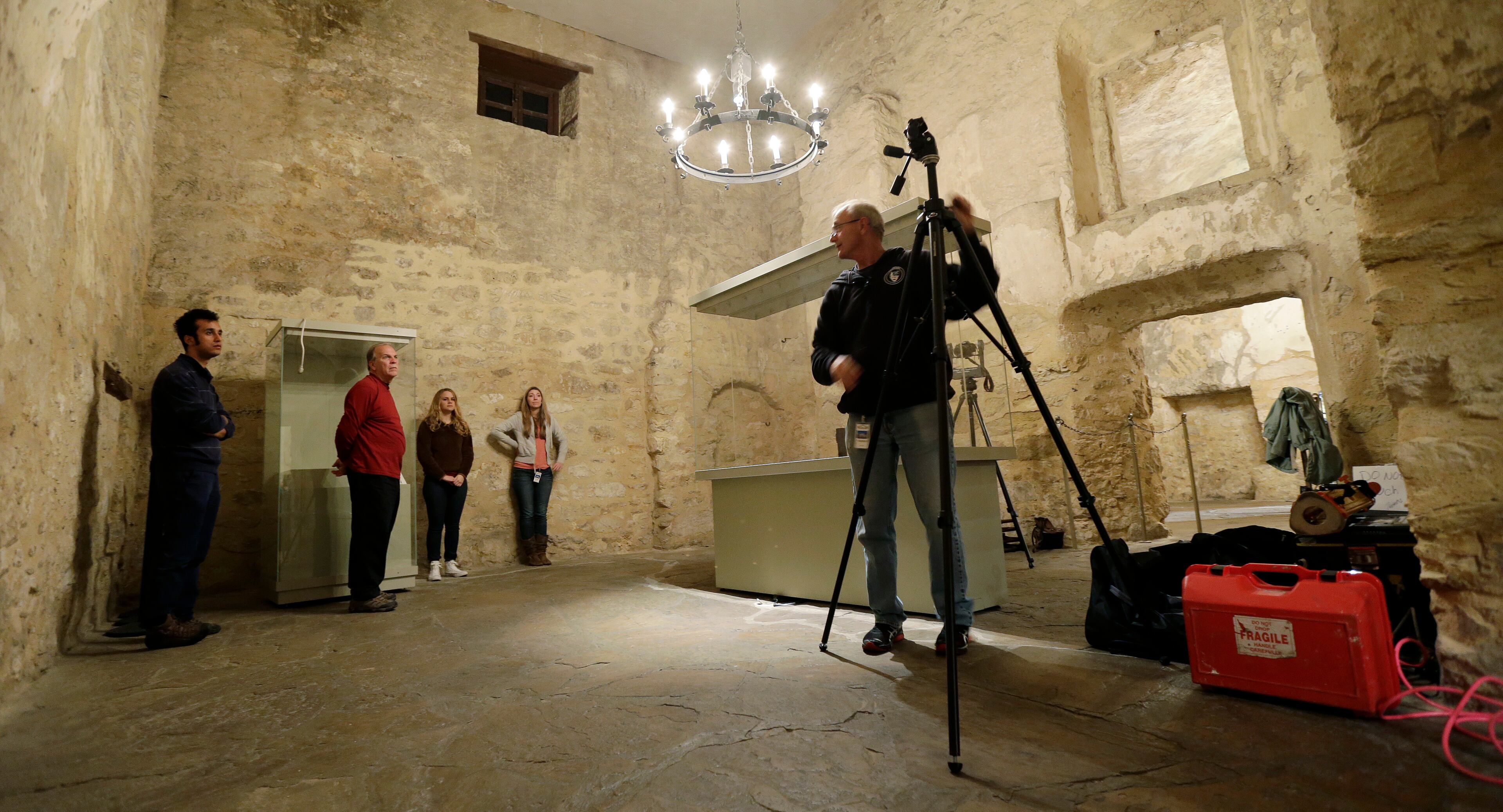 Bob Warden, right, project leader, professor of architecture and director of the Center for Heritage Conservation at Texas A&M, sets up equipment to record images at the Alamo, Thursday, Jan. 9, 2014, in San Antonio. Warden is leading a team in assembling digital two- and three-dimensional highly defined photos and laser images as part of a nearly 2-year-long project to help aid in preservation of the famous shrine to Texas independence and ensure future generations will be able to remember the Alamo.
