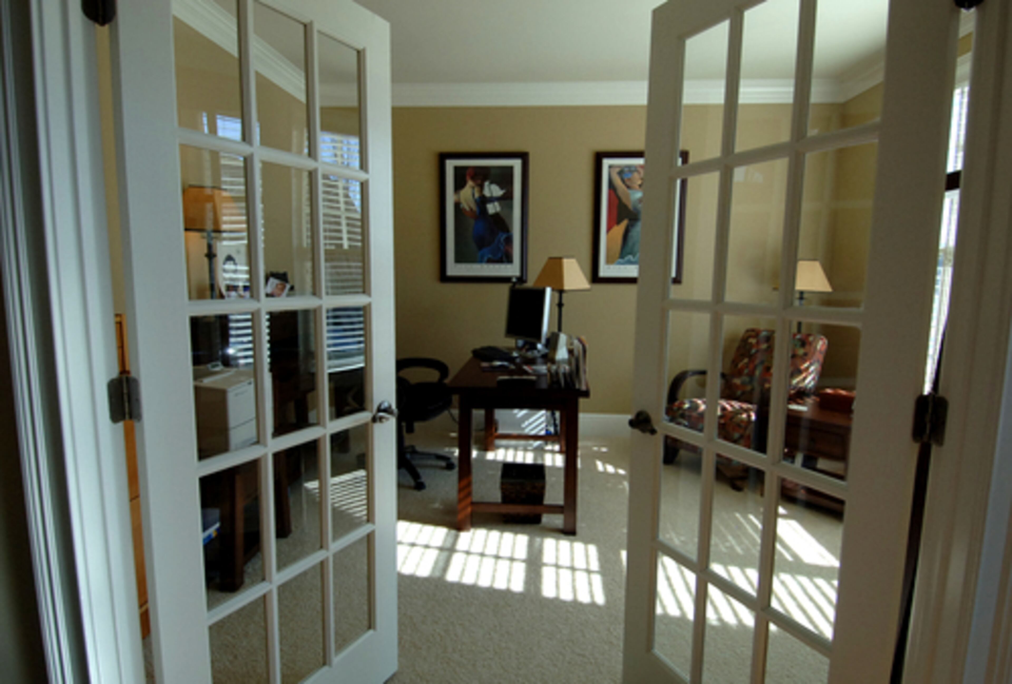 French doors lead to the home office.