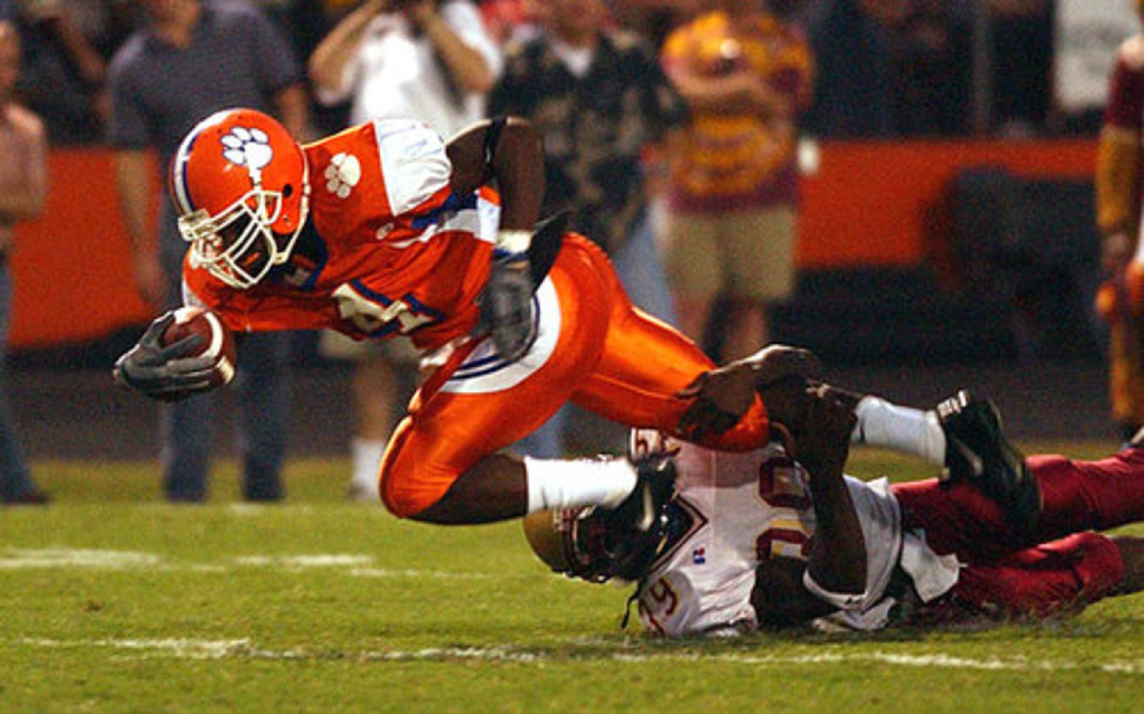 LB Rennie Curran (right), Brookwood: Finished his career as Gwinnett County's all-time leading tackler, including this one on Caleb King.