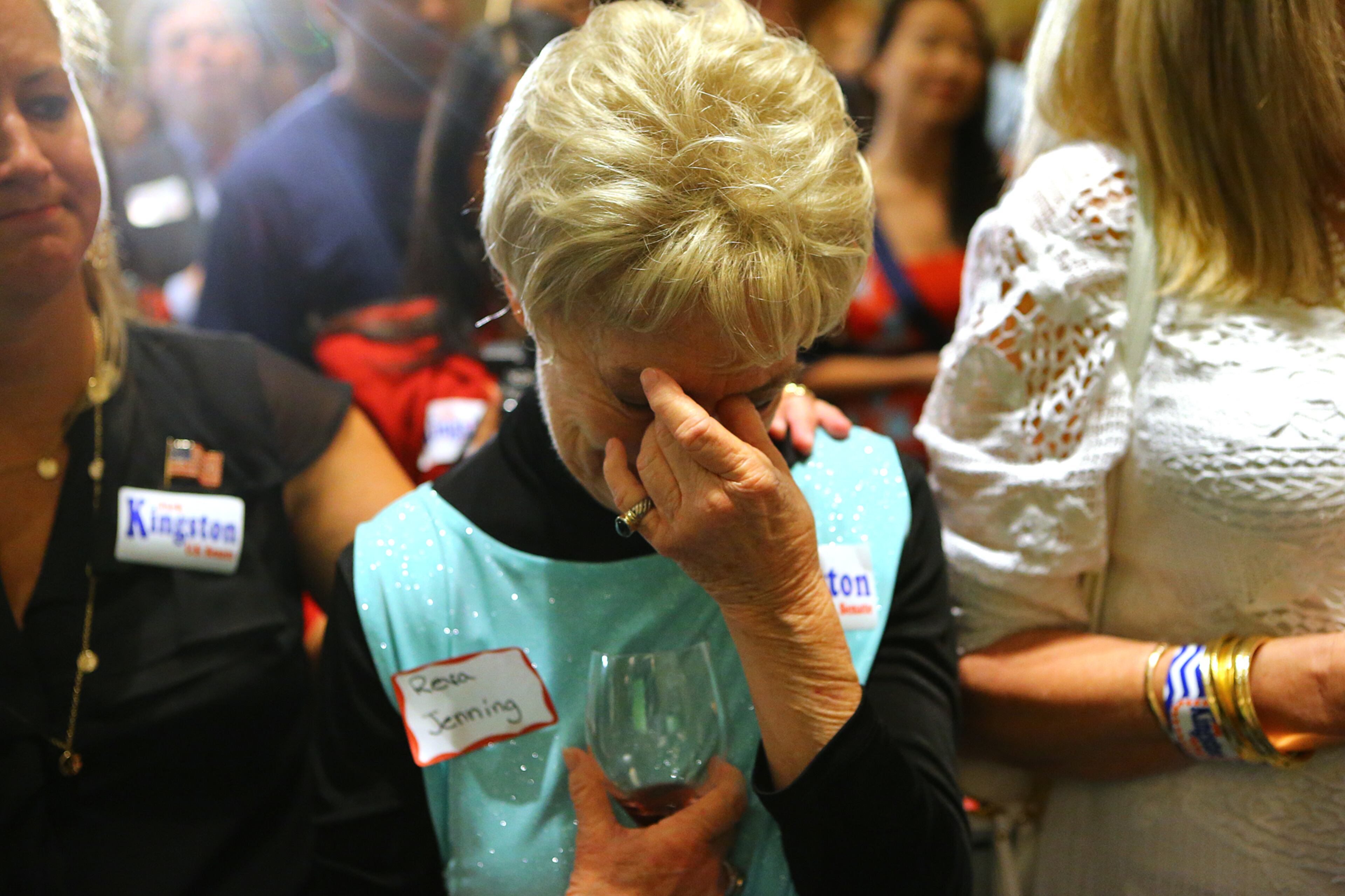 072214 ATLANTA: Supporter Reva Jenning is moved to tears as U.S. Senate candidate Jack Kingston concedes defeat to David Perdue at his election night party at the Georgia Tech Hotel & Conference Center on Tuesday, July 22, 2014, in Atlanta. CURTIS COMPTON / CCOMPTON@AJC.COM