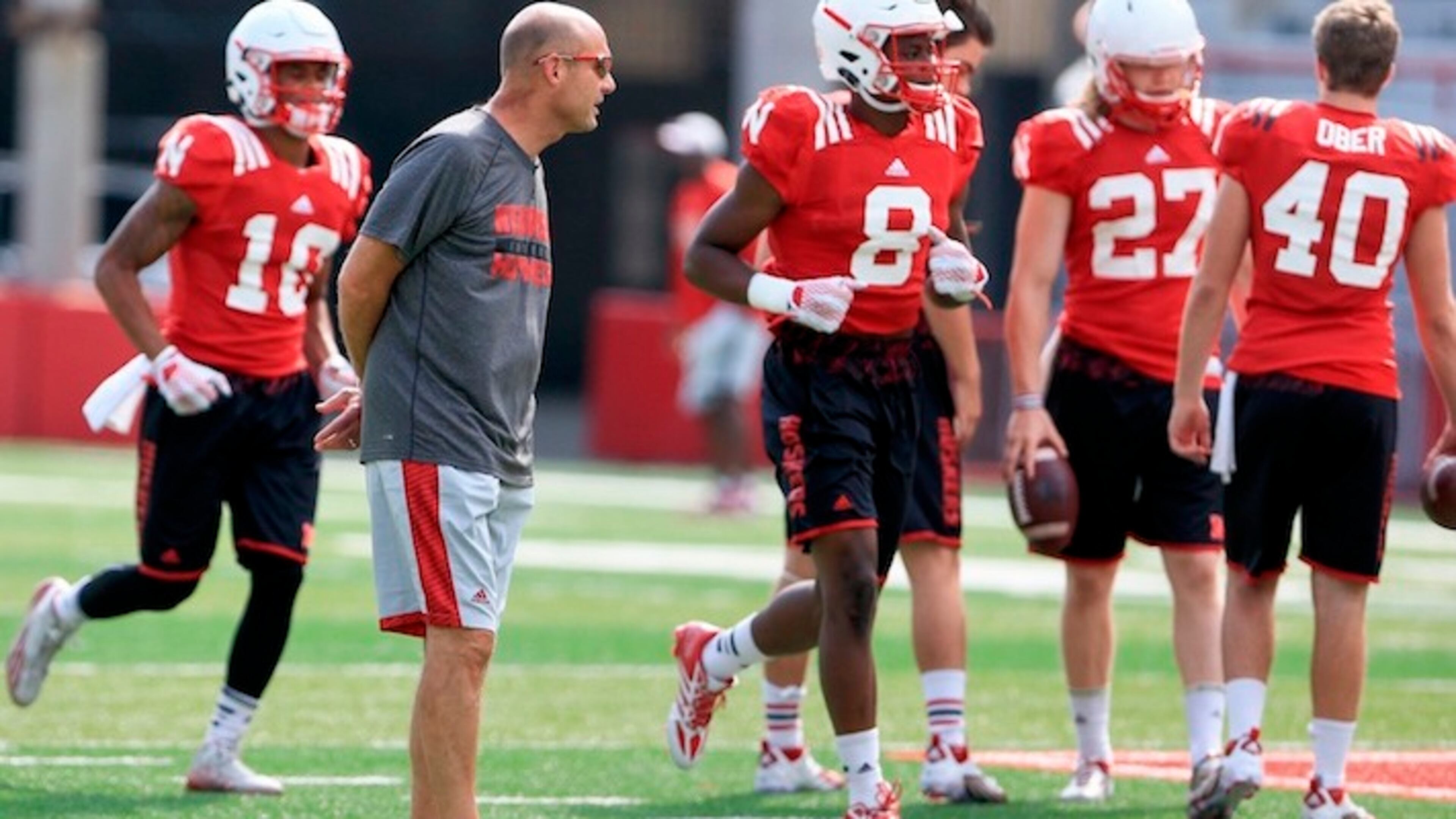 FILE - In this Tuesday, Sept. 1, 2015 file photo, Nebraska head coach Mike Riley follows NCAA college football practice in Lincoln, Neb. Even before Ivy League coaches voted to eliminate full-contact practices from the regular season, teams all across college have been following the NFL's lead by cutting back on the amount and intensity of hitting done while preparing players for game day, Wednesday, March 2, 2016. (AP Photo/Nati Harnik, File)