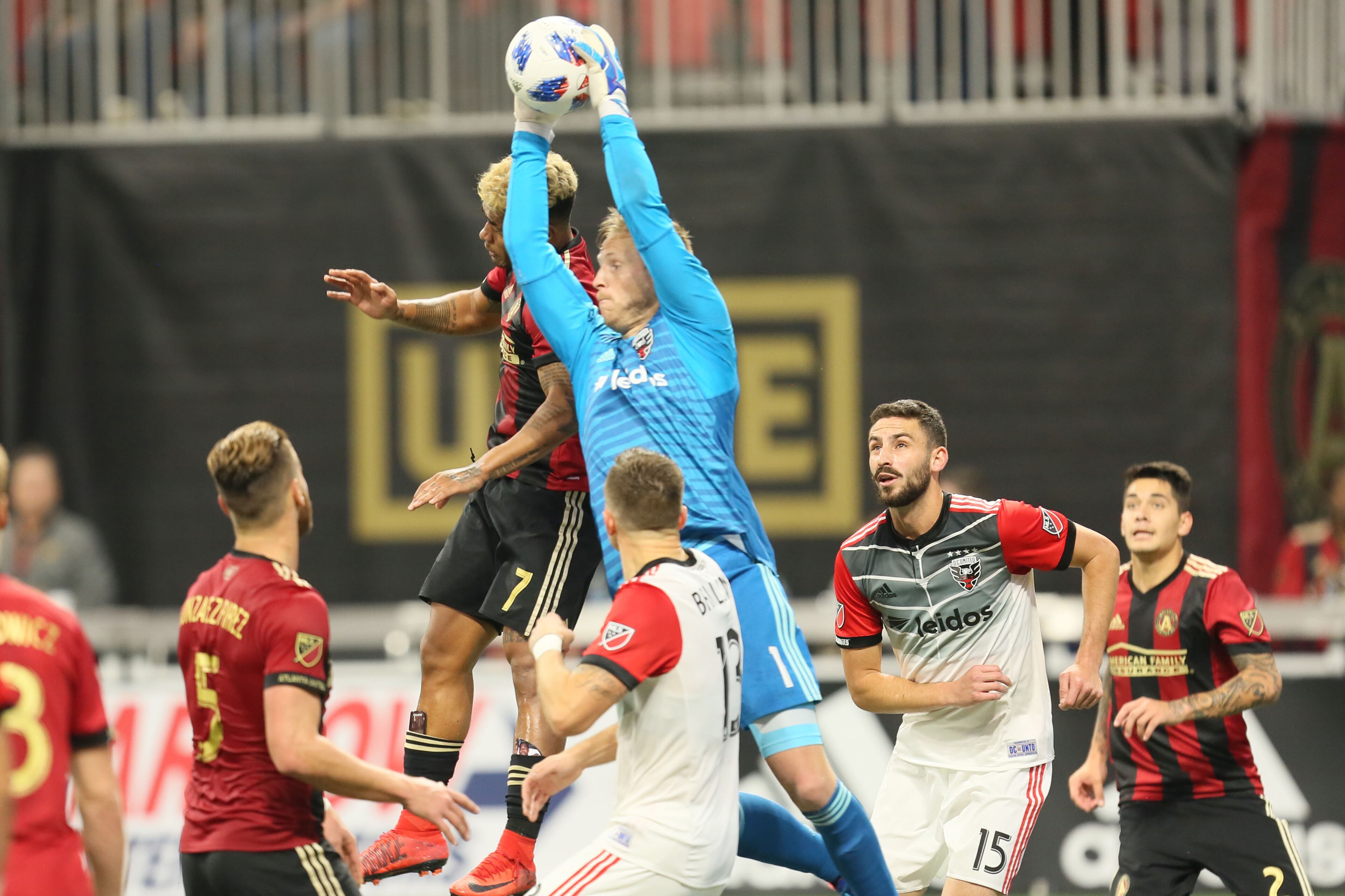 March 11, 2018. DC United goal keeper grabs the ball on a corner kick rejecting a opportunity to Atlanta United forward Josef Martinez on March 11, 2018 in Atlanta Ga.