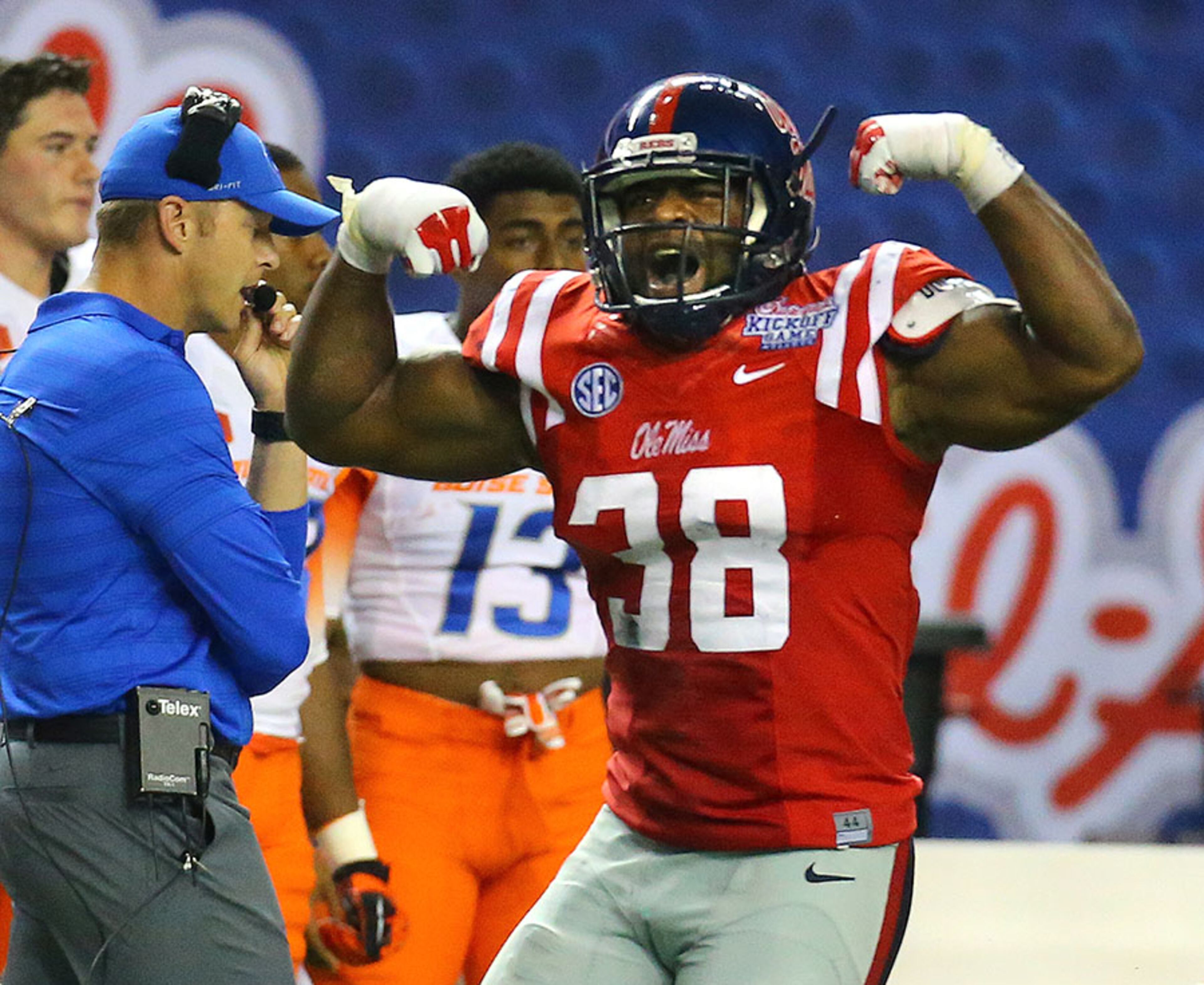 Ole Miss linebacker Deterrian Shackleford flexes after sacking Boise State quarterback Grant Hendrick . The No. 18 Rebels struggled to a 7-6 lead heading to the fourth quarter against Boise State, but scored three times in the final period, and Ole Miss pulled away for a sloppy 35-13 victory Thursday night in the Chick-fil-A Kickoff Classic at the Georgia Dome in Atlanta.
