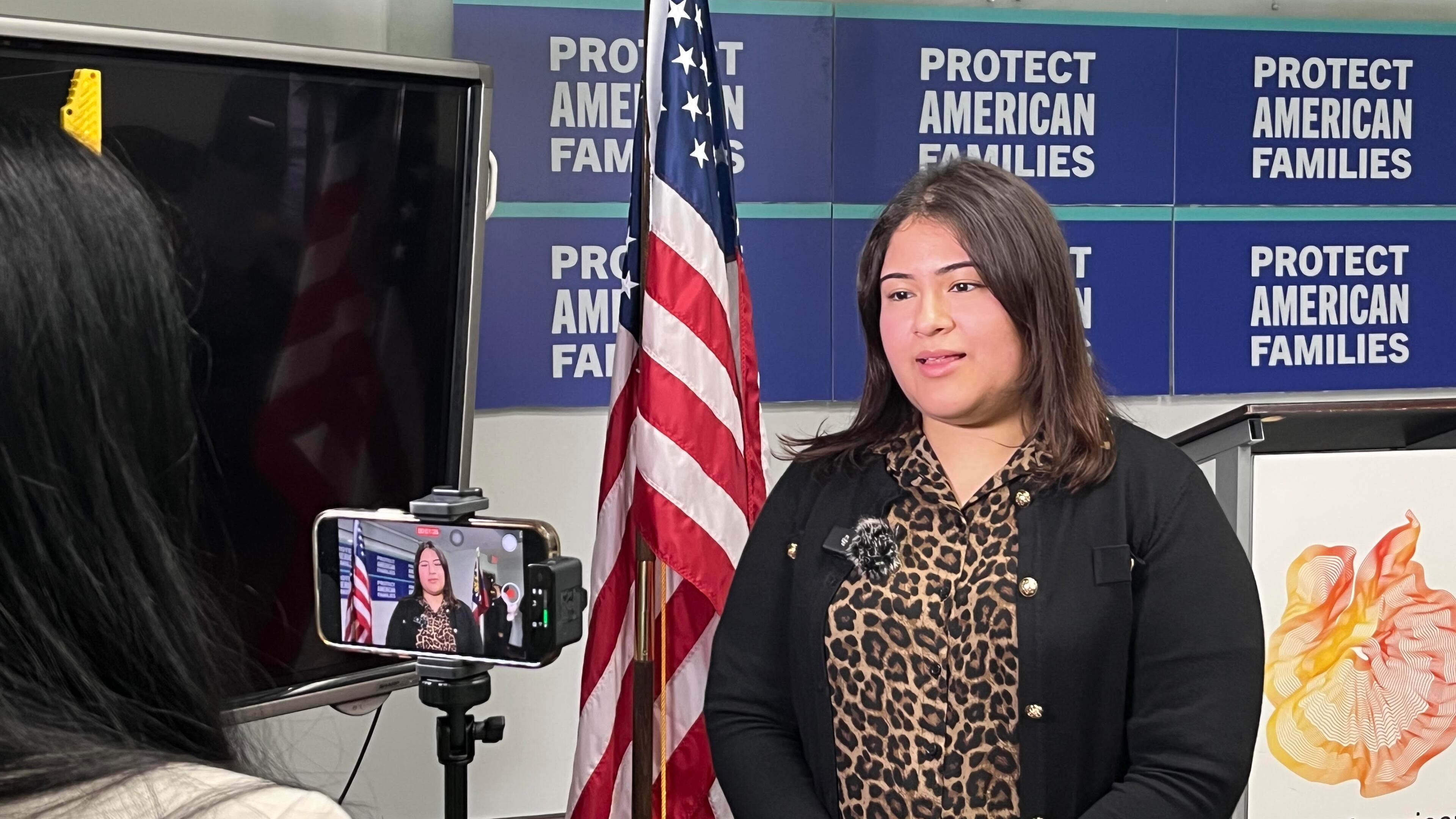 Briseyda Neri speaks to reporters at the Latin American Association in Atlanta on Wednesday, May 15. (Lautaro Grinspan)