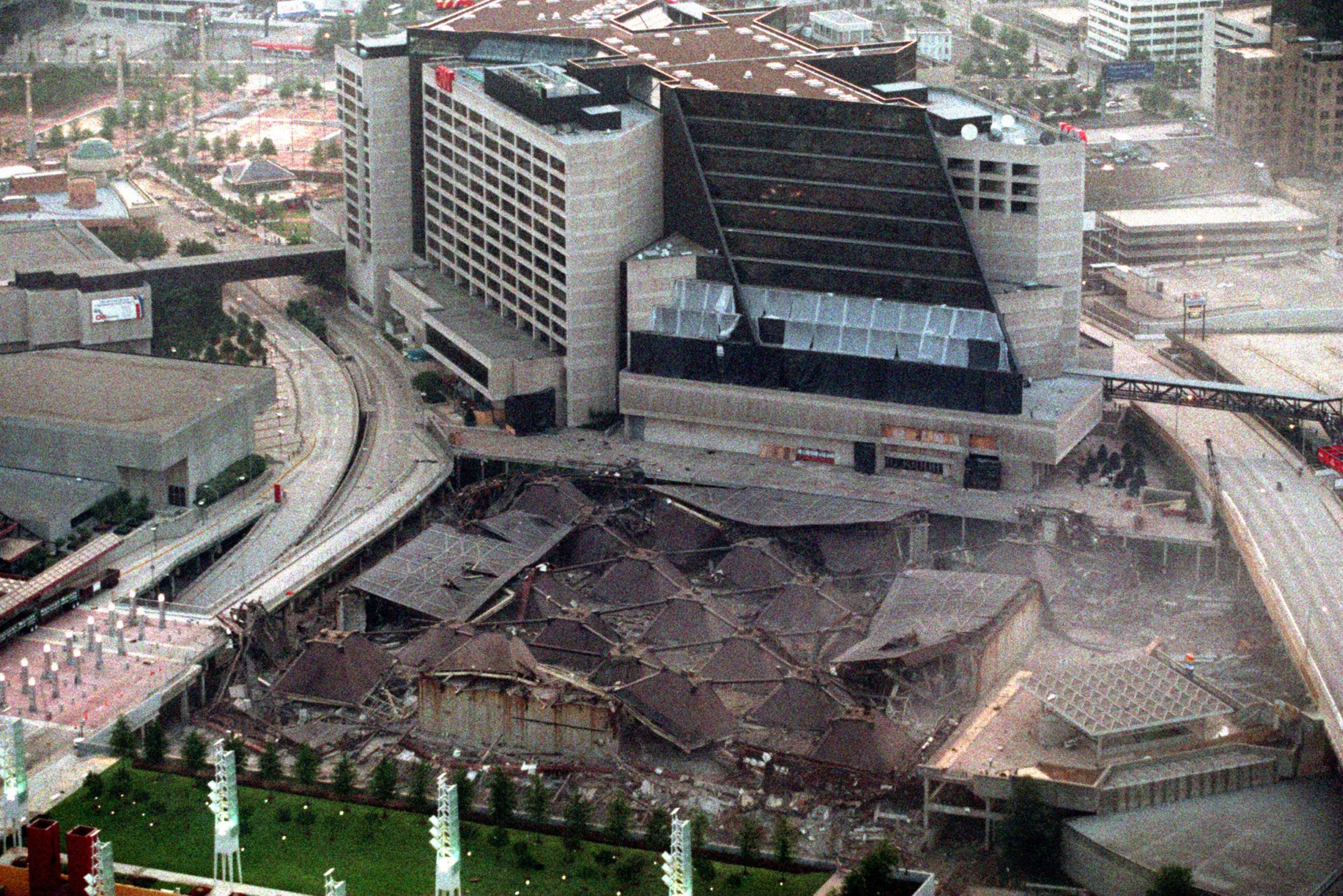 970726 - Atlanta, Georgia - This aerial photo shows the Omni after with the roof collapsed after its implosion Saturday morning, July 26, 1997. (AJC Staff Photo/Mark Adams)
