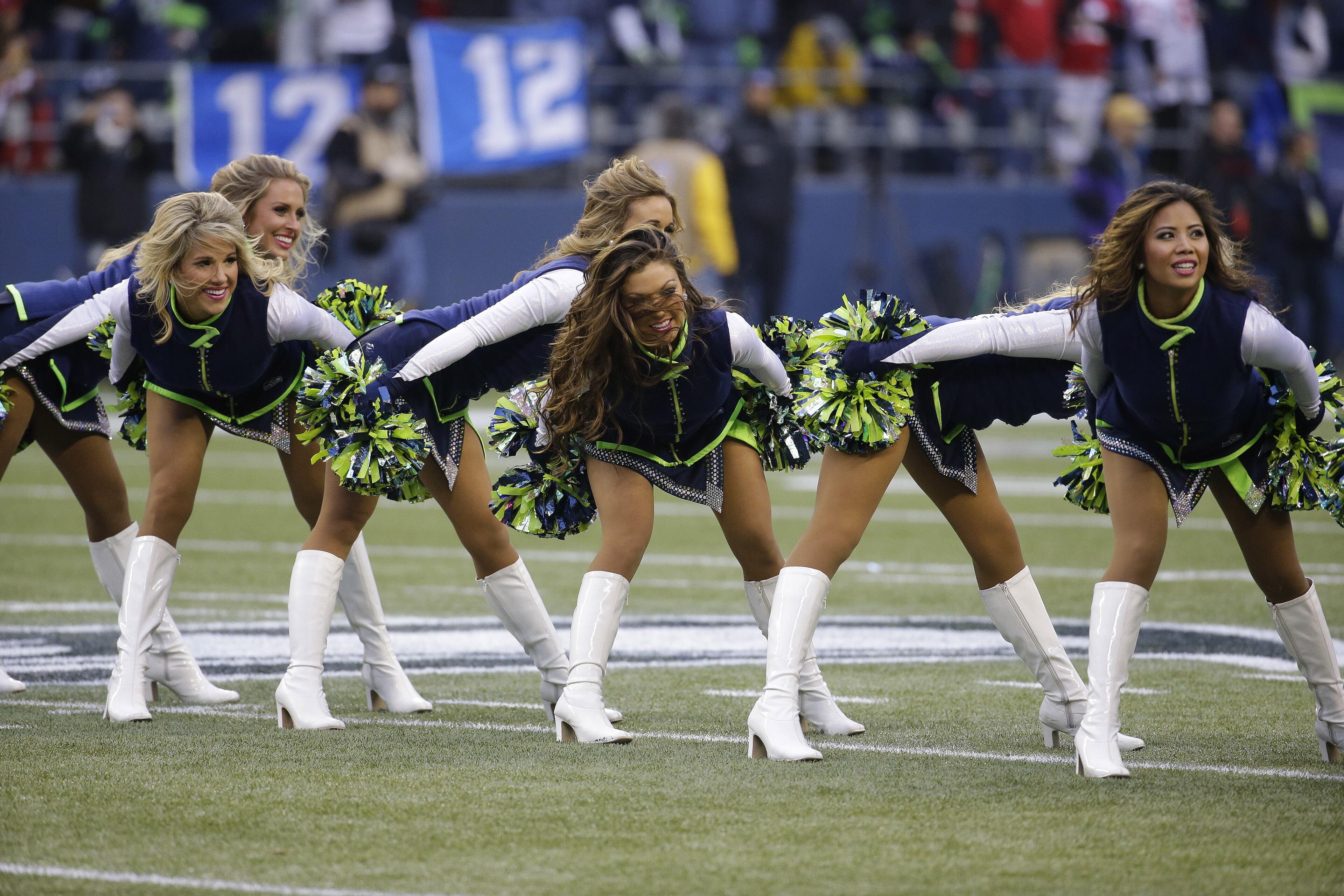 Seattle Seahawks cheerleaders perform before the NFL football NFC Championship game against the San Francisco 49ers on Jan. 19, 2014, in Seattle.