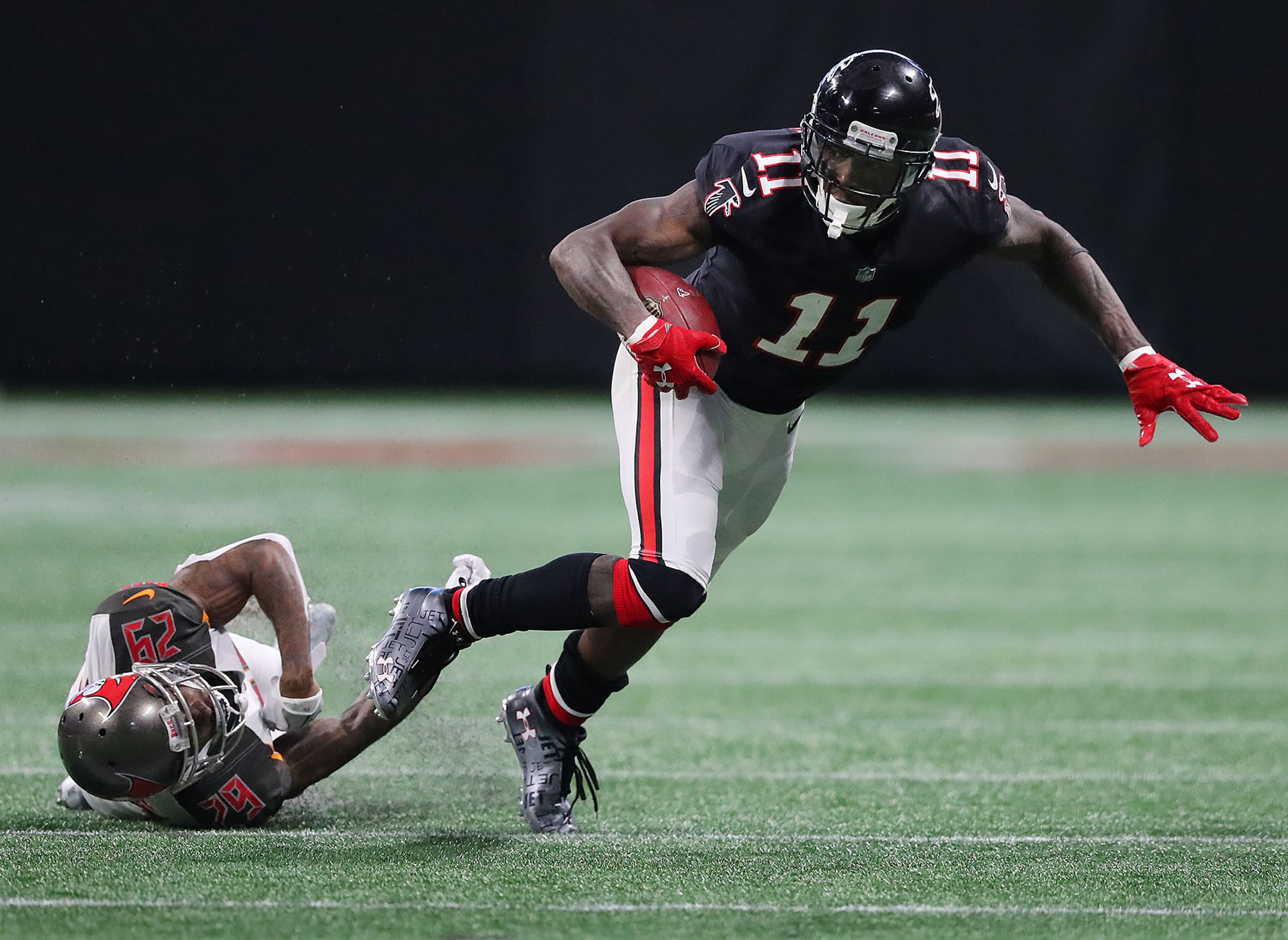 November 26, 2017 Atlanta: Falcons wide receiver Julio Jones makes a first down catch against Buccaneers defender Ryan Smith during the second half in a NFL football game on Sunday, November 26, 2017, in Atlanta. Curtis Compton/ccompton@ajc.com
