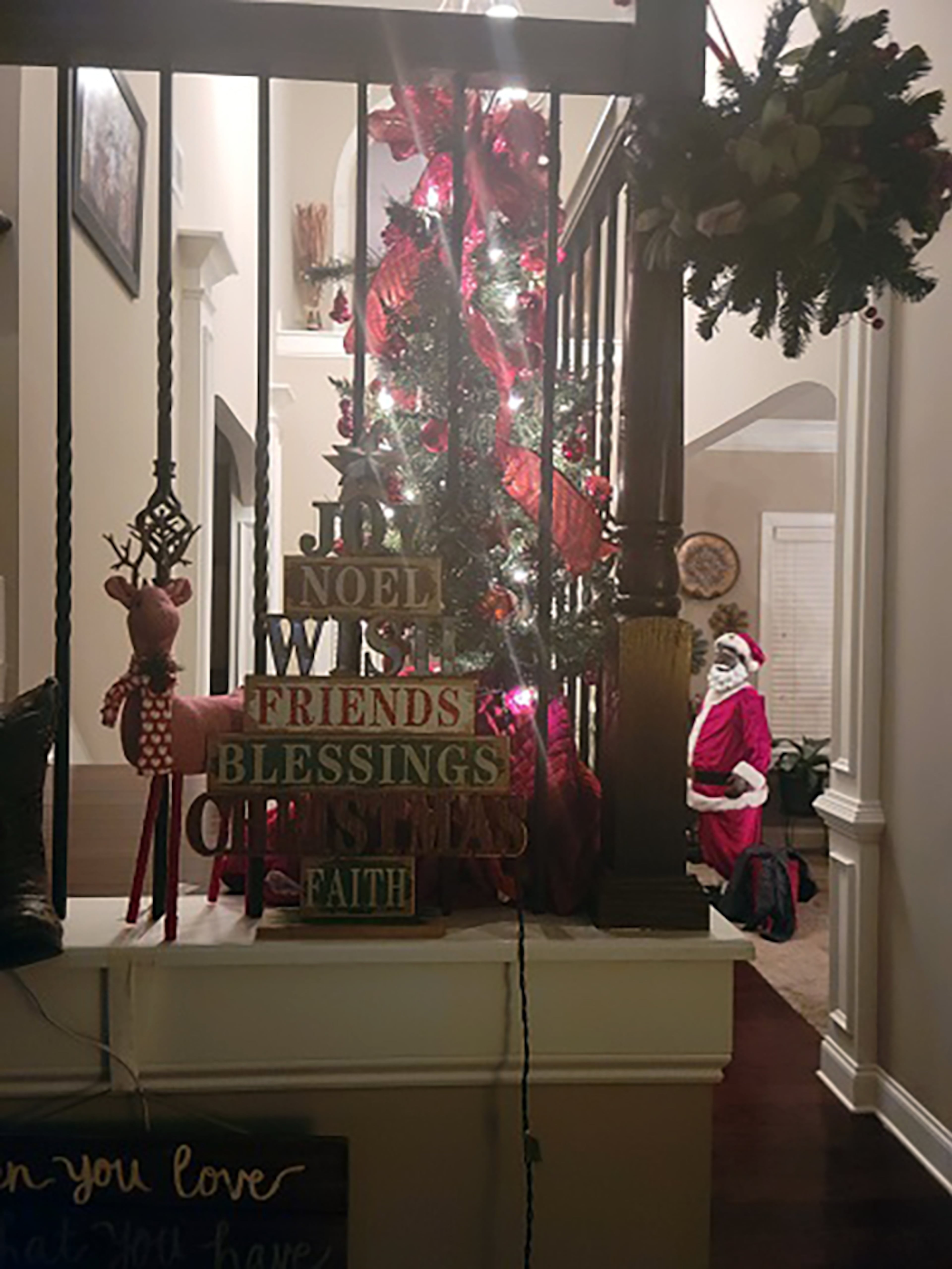 Cato family in Conyers "LOVES the holidays and the warm happy spirit it brings. We put Christmas trees everywhere there is room," Kelly Cato said. The trees are all coordinated by color and holiday spirit. This one is their stairs.