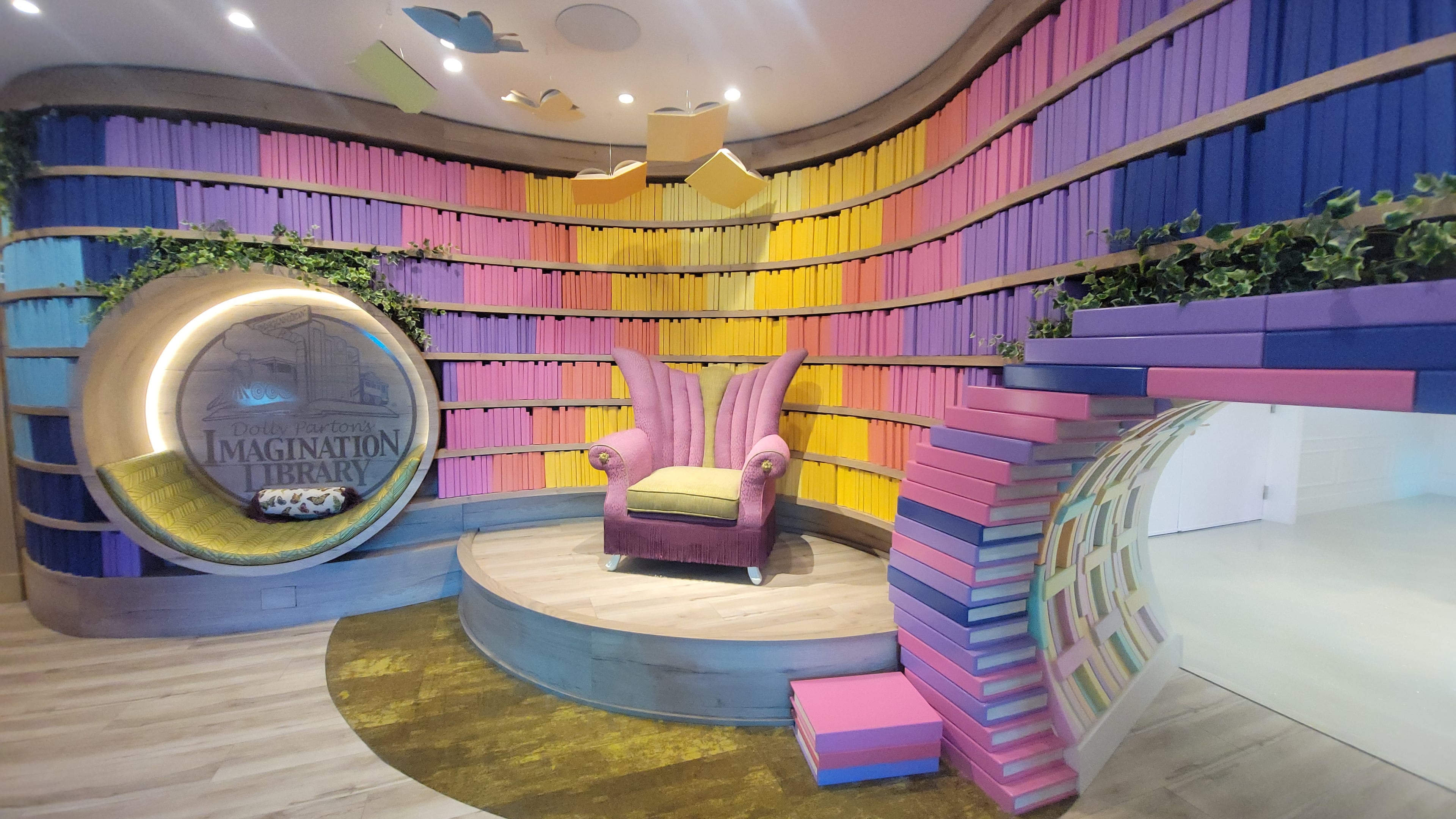 An exhibit celebrates Dolly Parton’s Imagination Library, the literacy program she founded to give children free books and foster a lifelong love of reading. (Tracey Teo for the AJC)