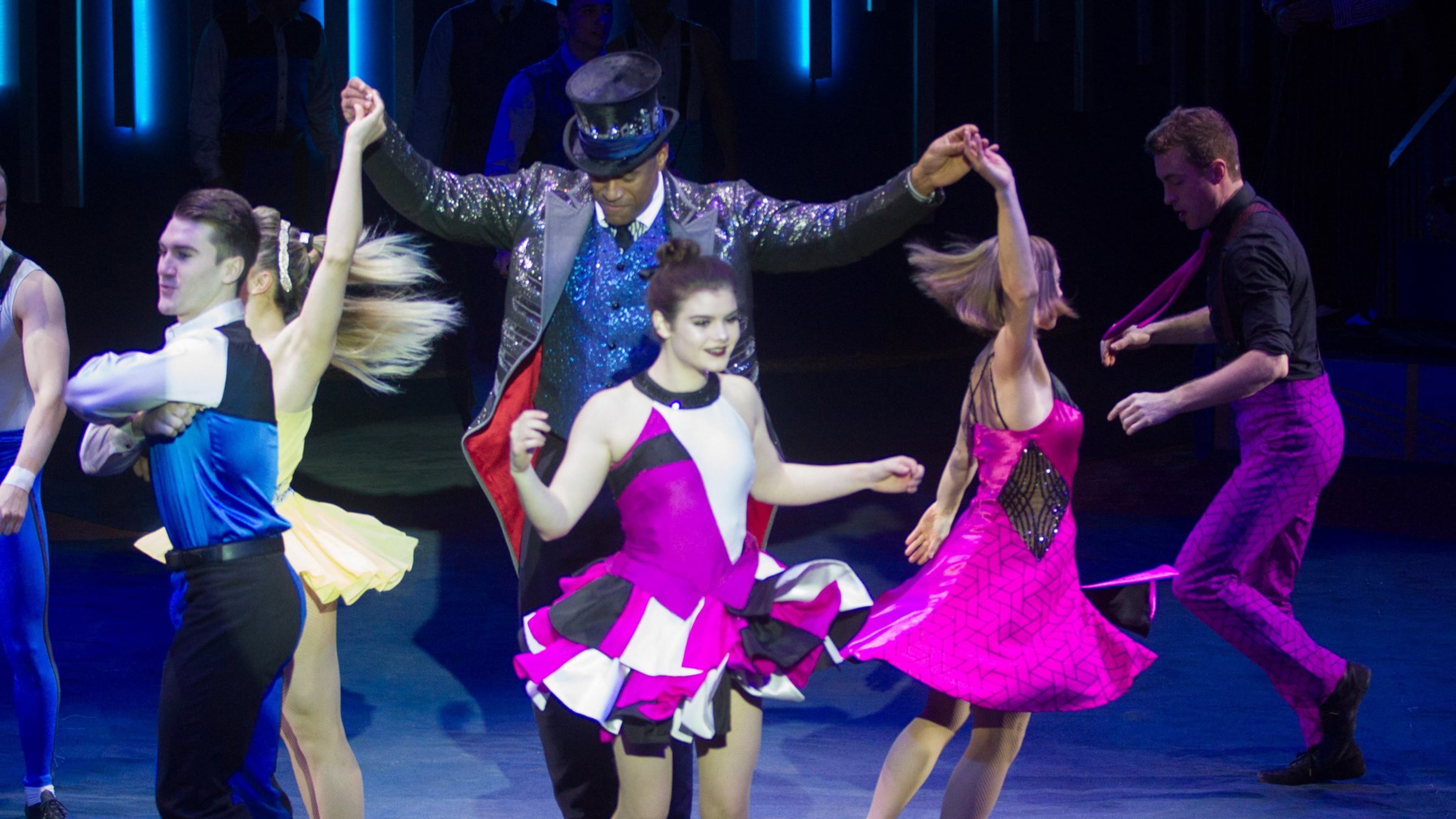 Ringmaster Tyron McFarlan (center) entertains the crowd in Alpharetta during a recent Sunday afternoon performance of the Big Apple Circus, which is in its 40th anniversary season. STEVE SCHAEFER / SPECIAL TO THE AJC